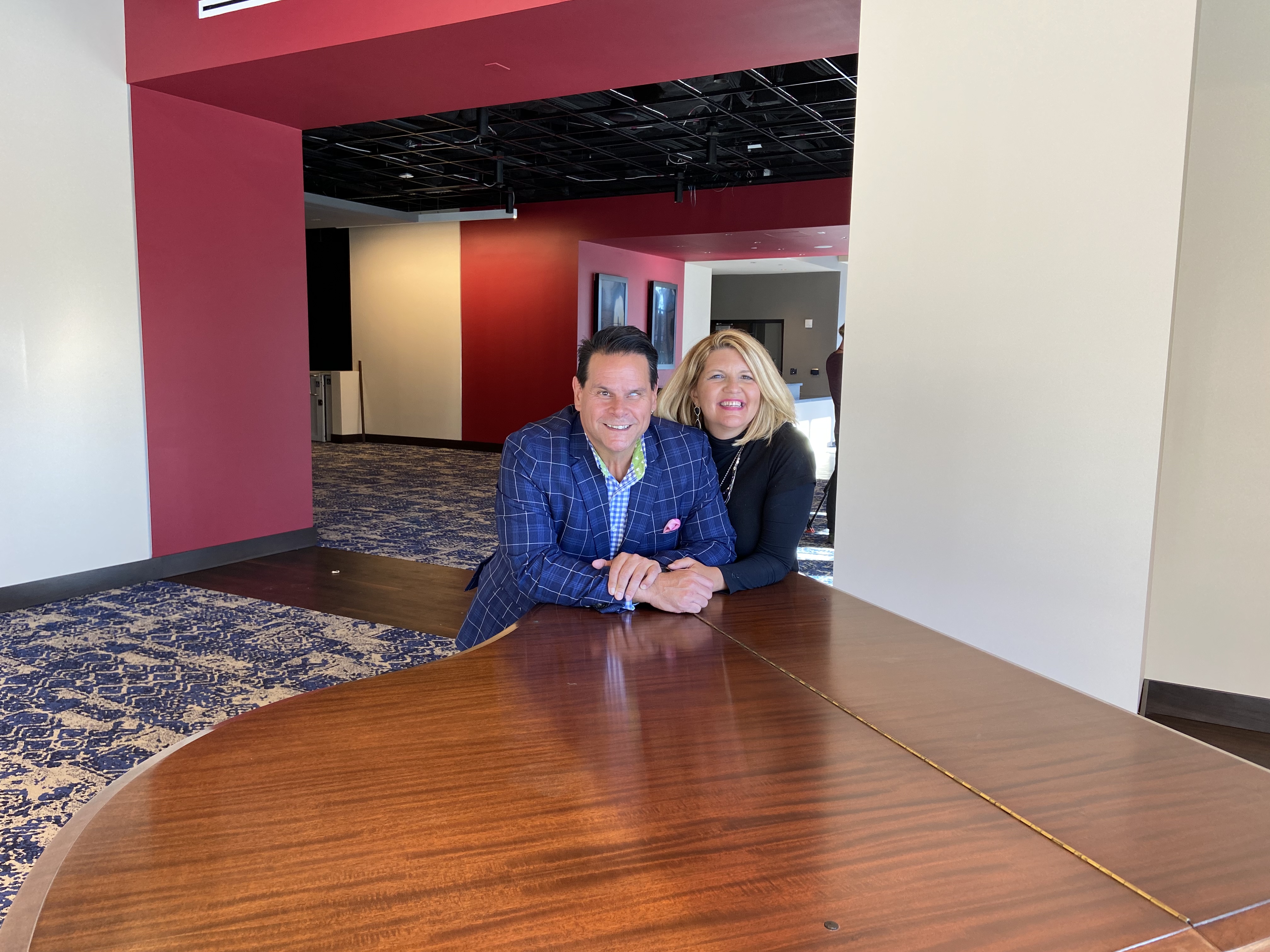 Anthony Rodriguez and Ann-Carol Pence inside the new Aurora Theater.
