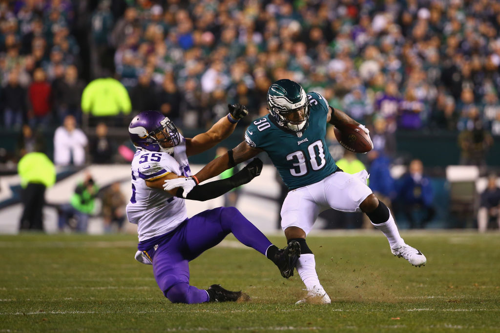 Philadelphia Eagles running back Corey Clement (30) is tackled by