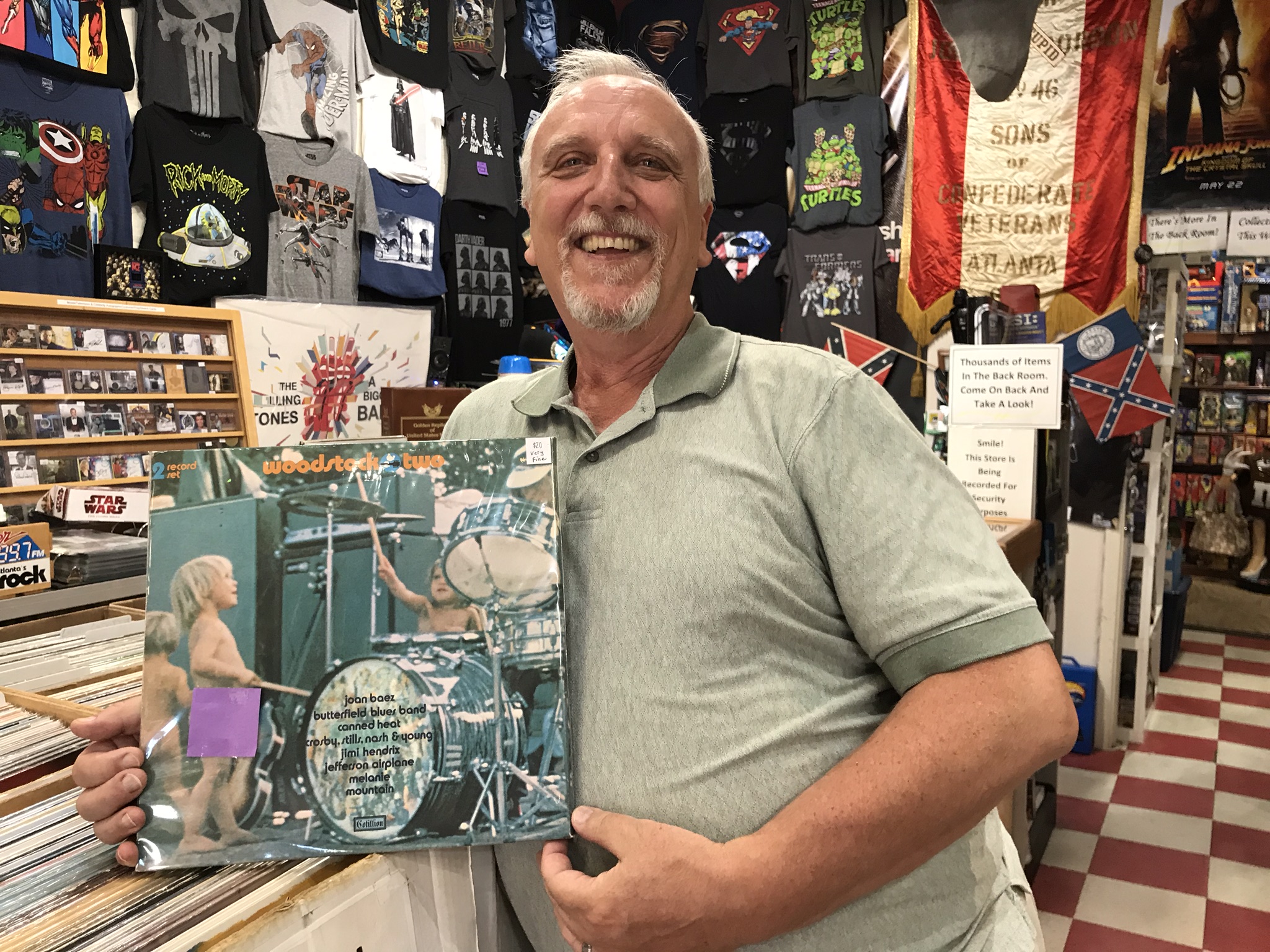 Tom Wright, owner of The Wright Stuff Records & Collectibles,in Woodstock. CREDIT: Rodney Ho/rho@ajc.com