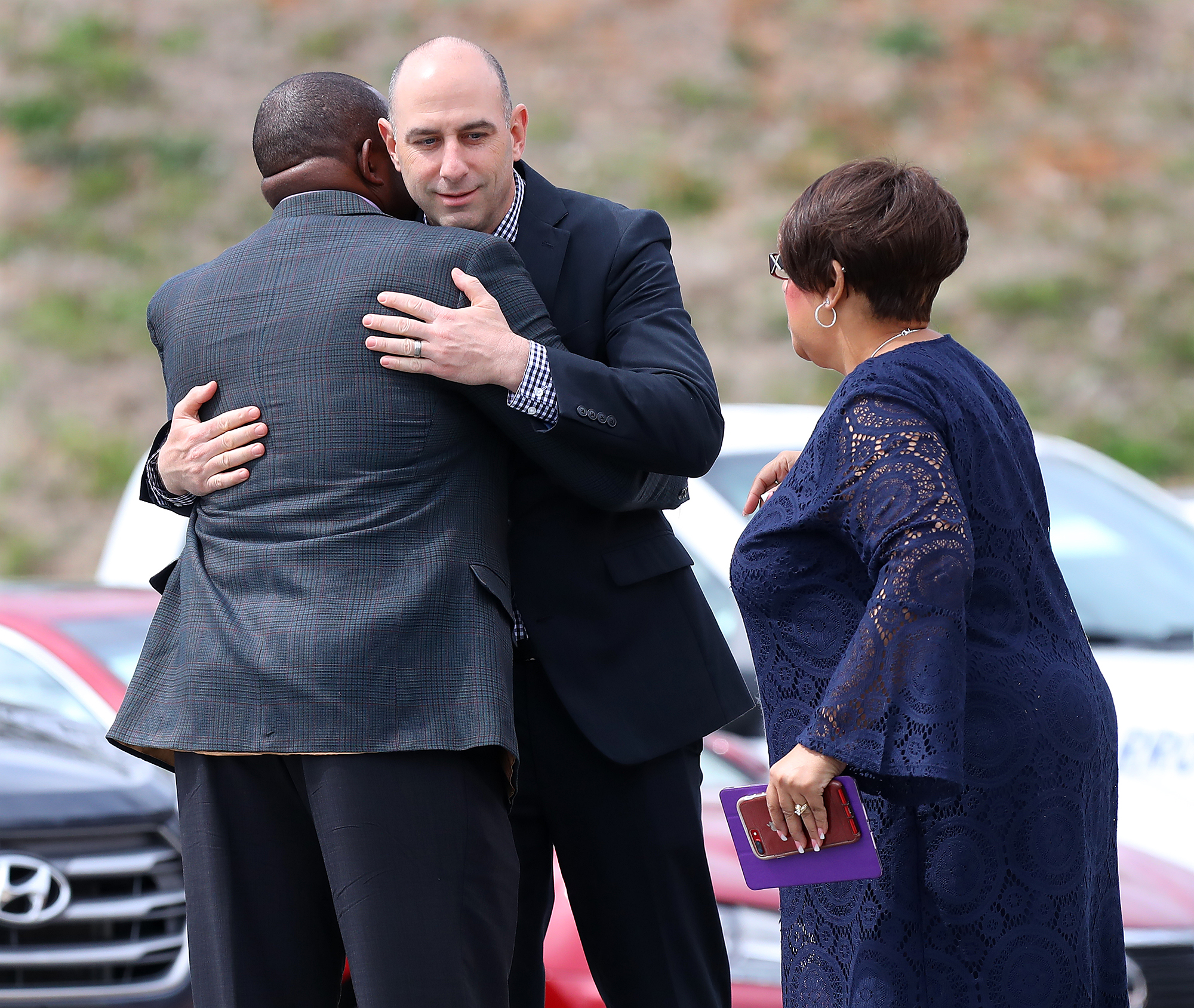 March 18, 2018 Jefferson: People share hugs as local residents, family, friends, and church members arrive for the Tripp Halstead Memorial at the Jefferson Civic Center on Sunday, March 18, 2018, in Jefferson. The 7-year-old died Thursday following a traumatic brain injury five years ago from a falling tree limb. Curtis Compton/ccompton@ajc.com