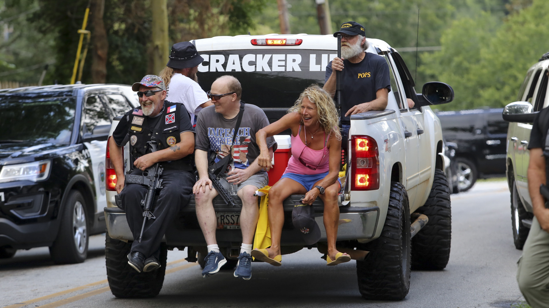 8/15/20 - Stone Mountain, GA - Several far-right groups, including militias and white supremacists, rally Saturday in the town of Stone Mountain, and a broad coalition of leftist anti-racist groups organized a counter-demonstration there after local authorities closed Stone Mountain park. Jenni Girtman for the Atlanta Journal Constitution