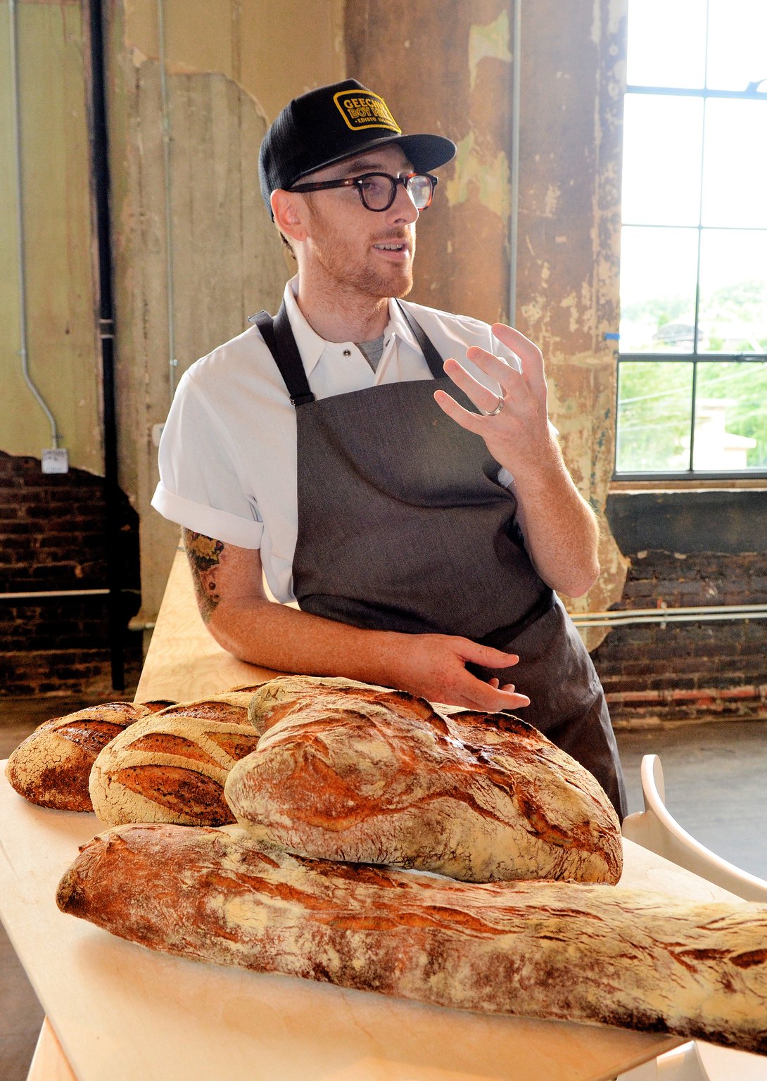 Chris Wilkins of Root Baking Co. sources his grains from numerous farms around the country and mills them in-house. Chris Hunt for The Atlanta Journal-Constitution