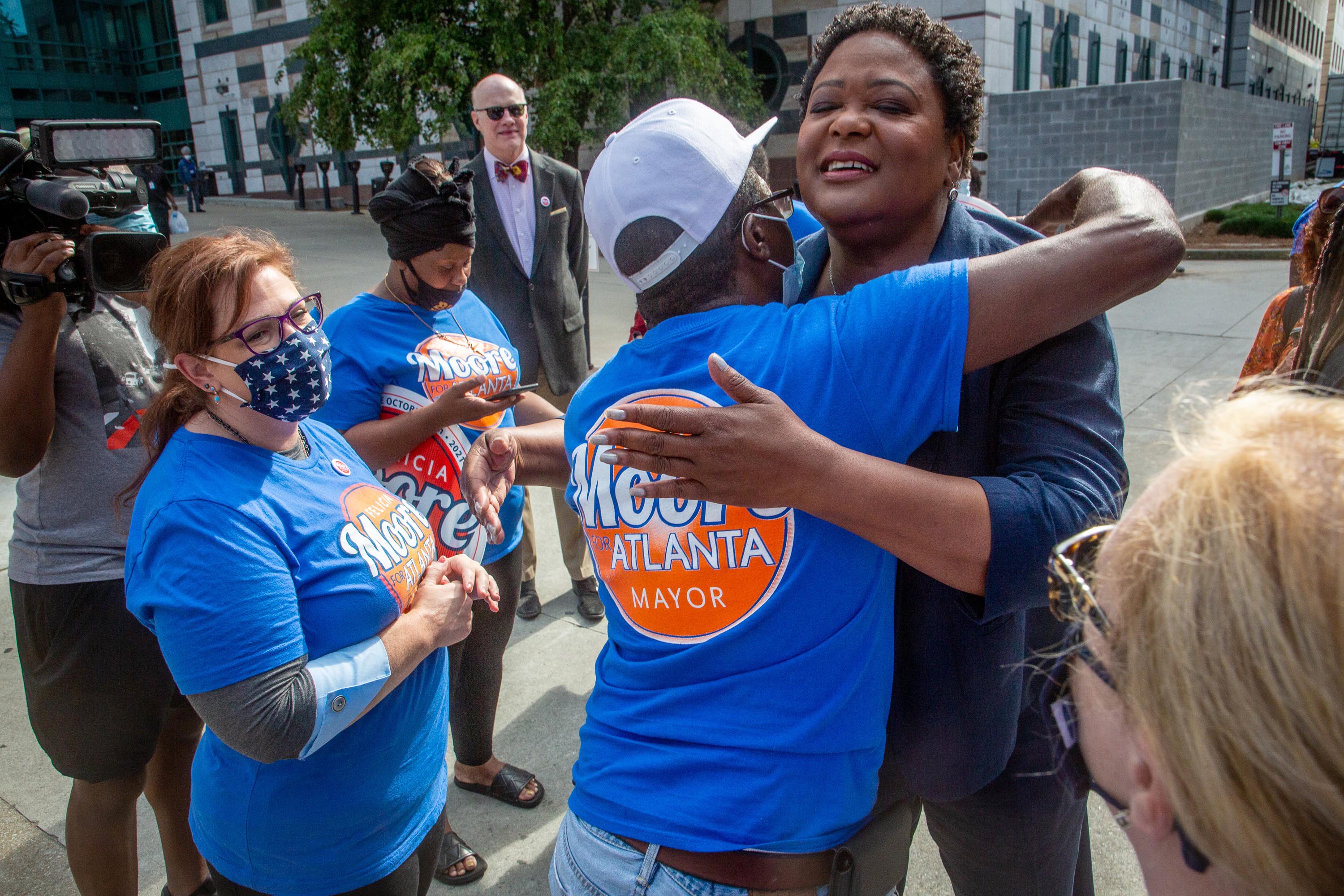 City Council President and mayoral candidate Felicia Moore talks with supporters after a press conference in Atlanta Friday, October 1, 2021. STEVE SCHAEFER FOR THE ATLANTA JOURNAL-CONSTITUTION