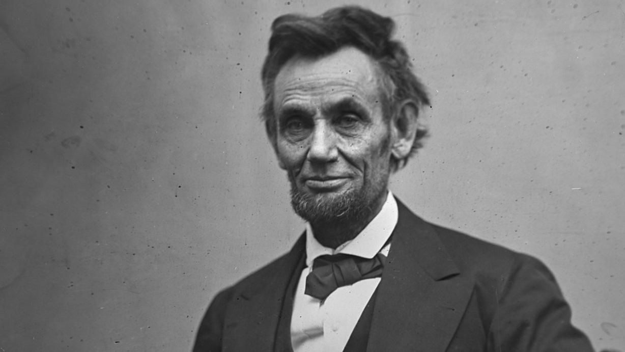 In this photo provided by the Library of Congress, President Abraham Lincoln, seated and holding his spectacles and a pencil on Feb. 5, 1865. (AP Photo/Library of Congress/Alexander Gardner)