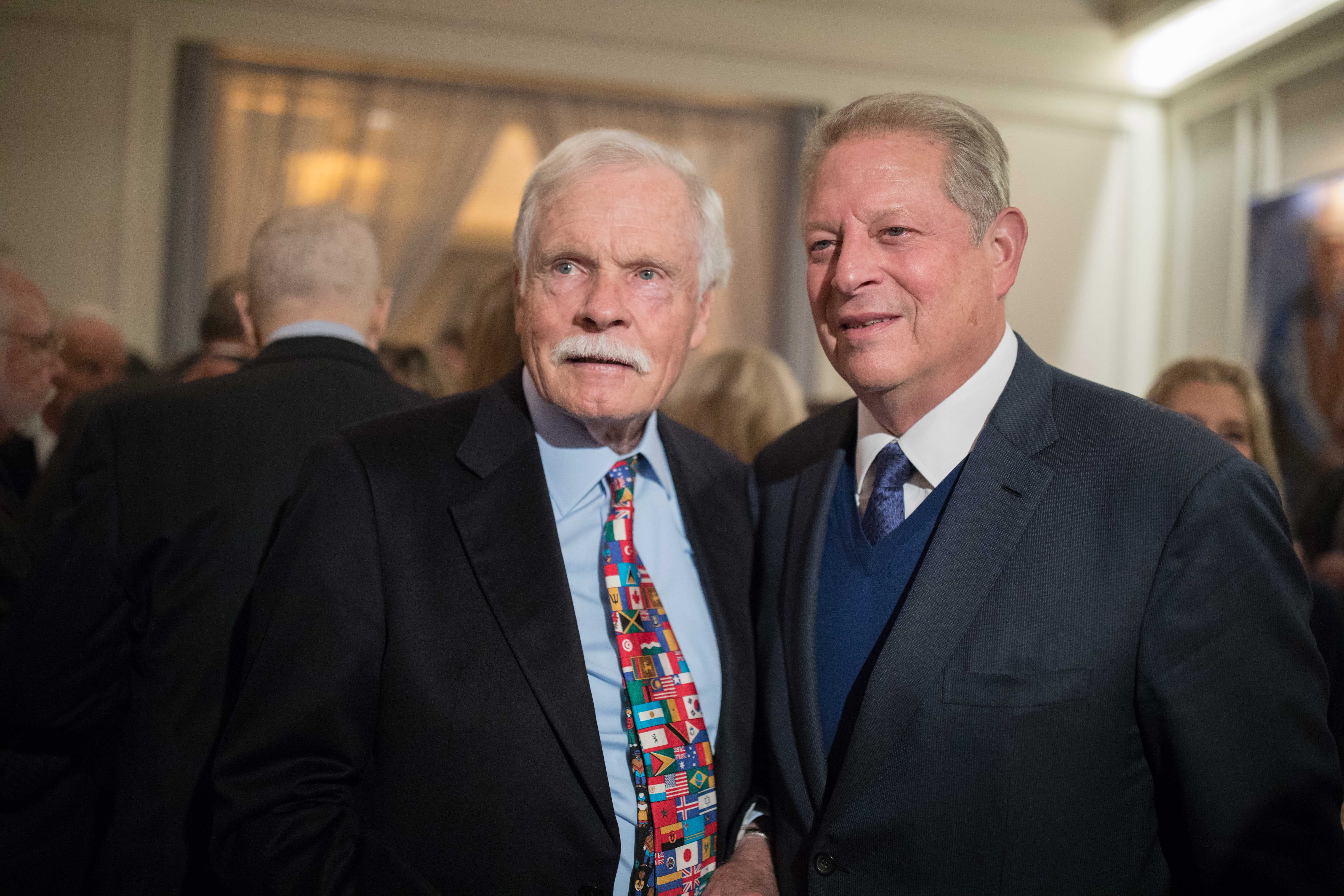 Ted Turner poses for a photo with former Vice President Al Gore during Turner's 80th birthday party at the St. Regis Atlanta hotel on Saturday, Nov. 17, 2018, in Atlanta. Turner, who recently announced he has Lewy body dementia, turns 80 on Monday. (Photo: BRANDEN CAMP/SPECIAL TO THE AJC)