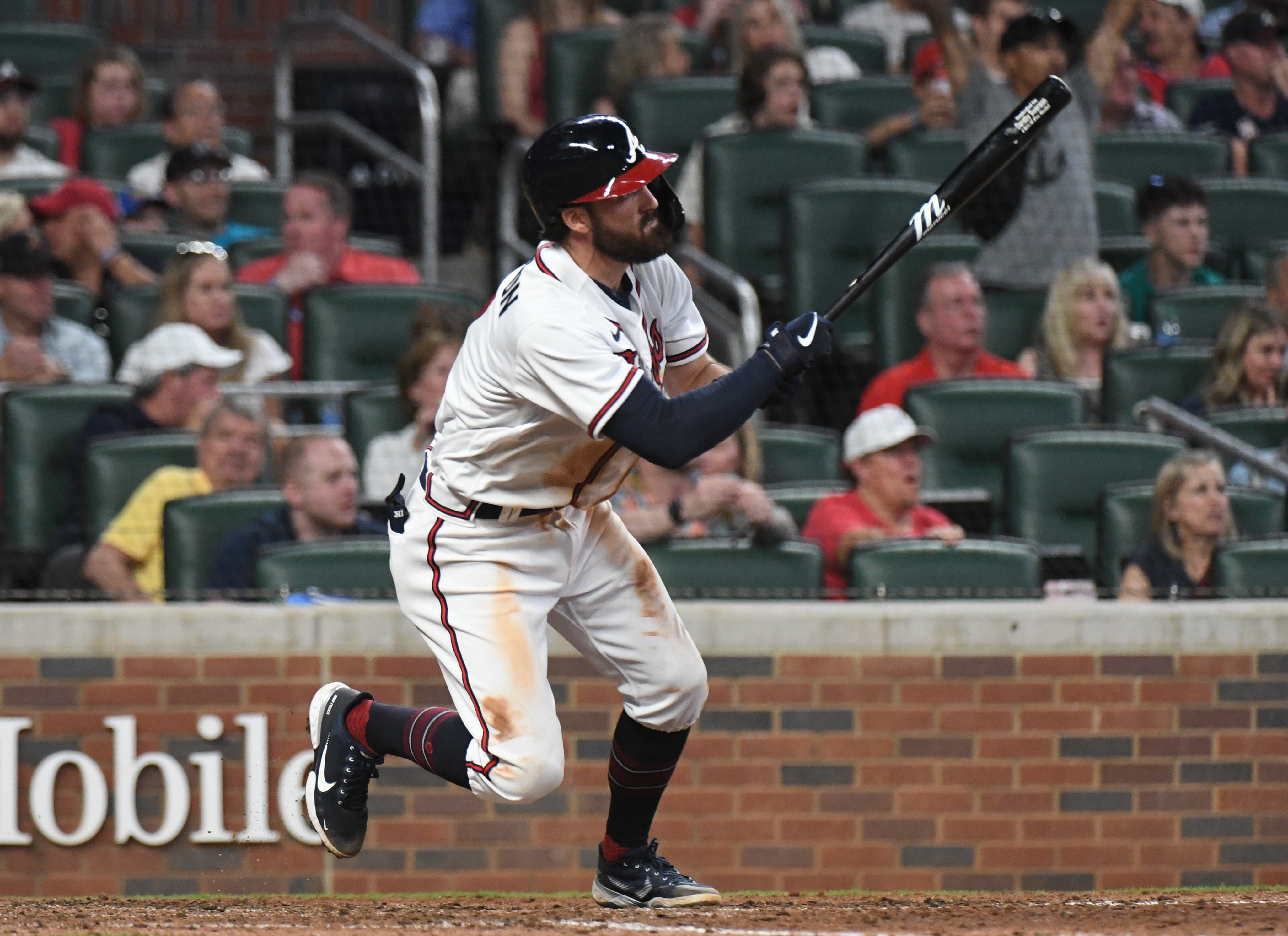 Dansby Swanson of the Atlanta Braves after sliding into third