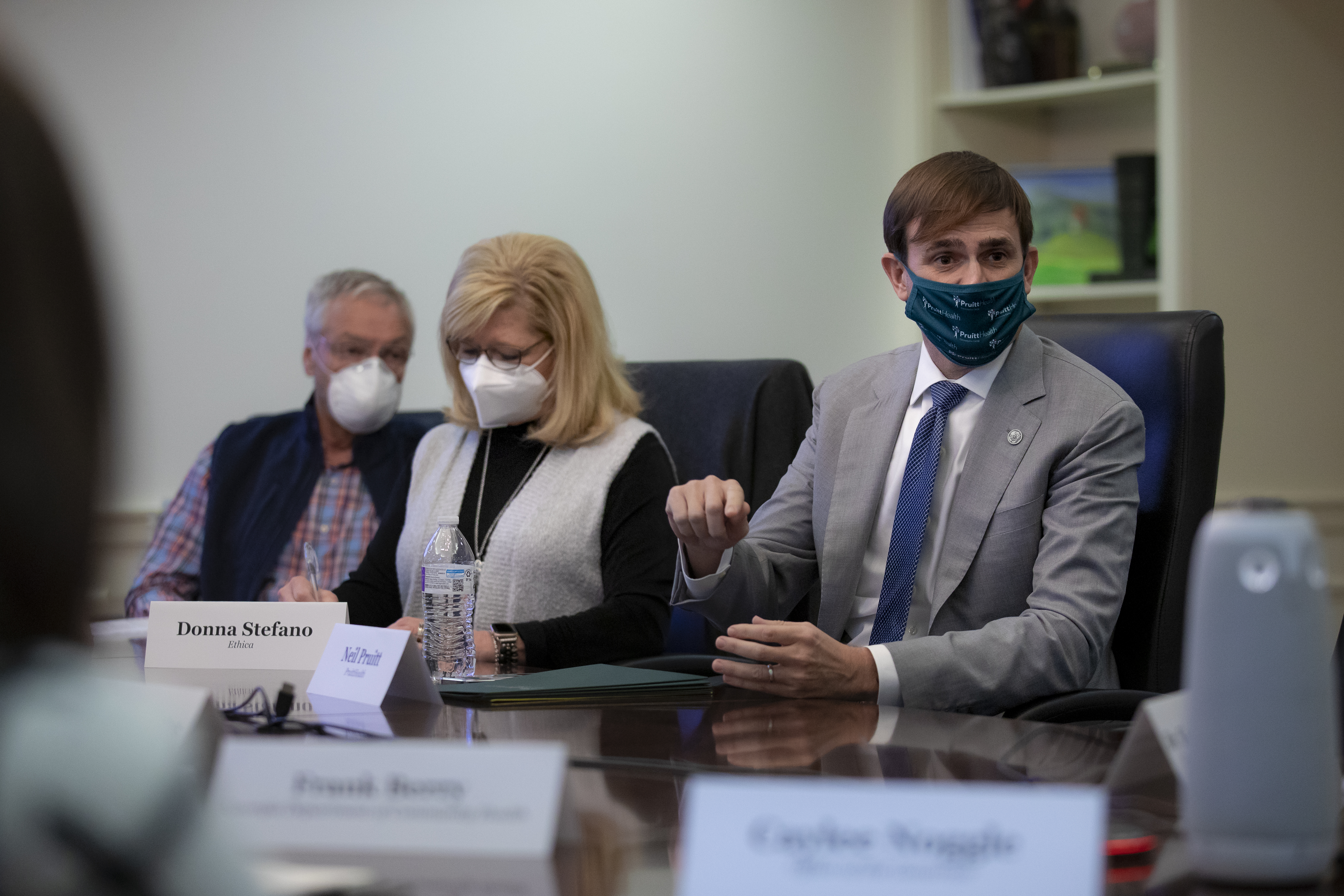 Neil Pruitt, Chairman and CEO of PruittHealth, right, told Gov. Brian Kemp on Monday, “Unfortunately, I think we’re going to be dealing with COVID for another six months.” (Photo courtesy of the Governor's Office)