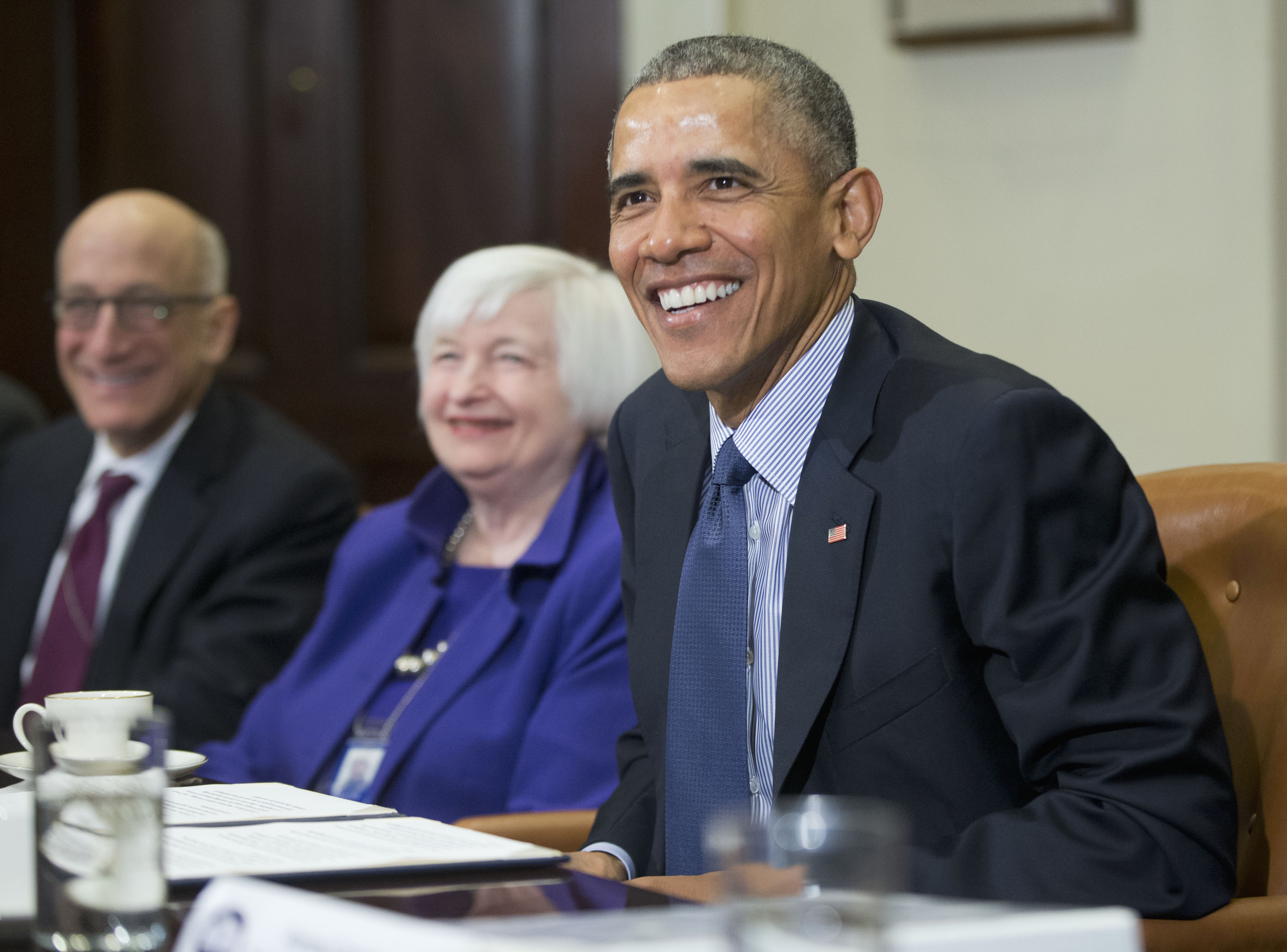 President Barack Obama smiles during his meeting with financial regulators in the Roosevelt Room of the White House in Washington, Monday, March 7, 2016. With Obama are; Commodity Futures Trading Commission (CFTC), Chairman Tim Massad, and Federal Reserve Board Chair Janet Yellen. (AP Photo/Pablo Martinez Monsivais)