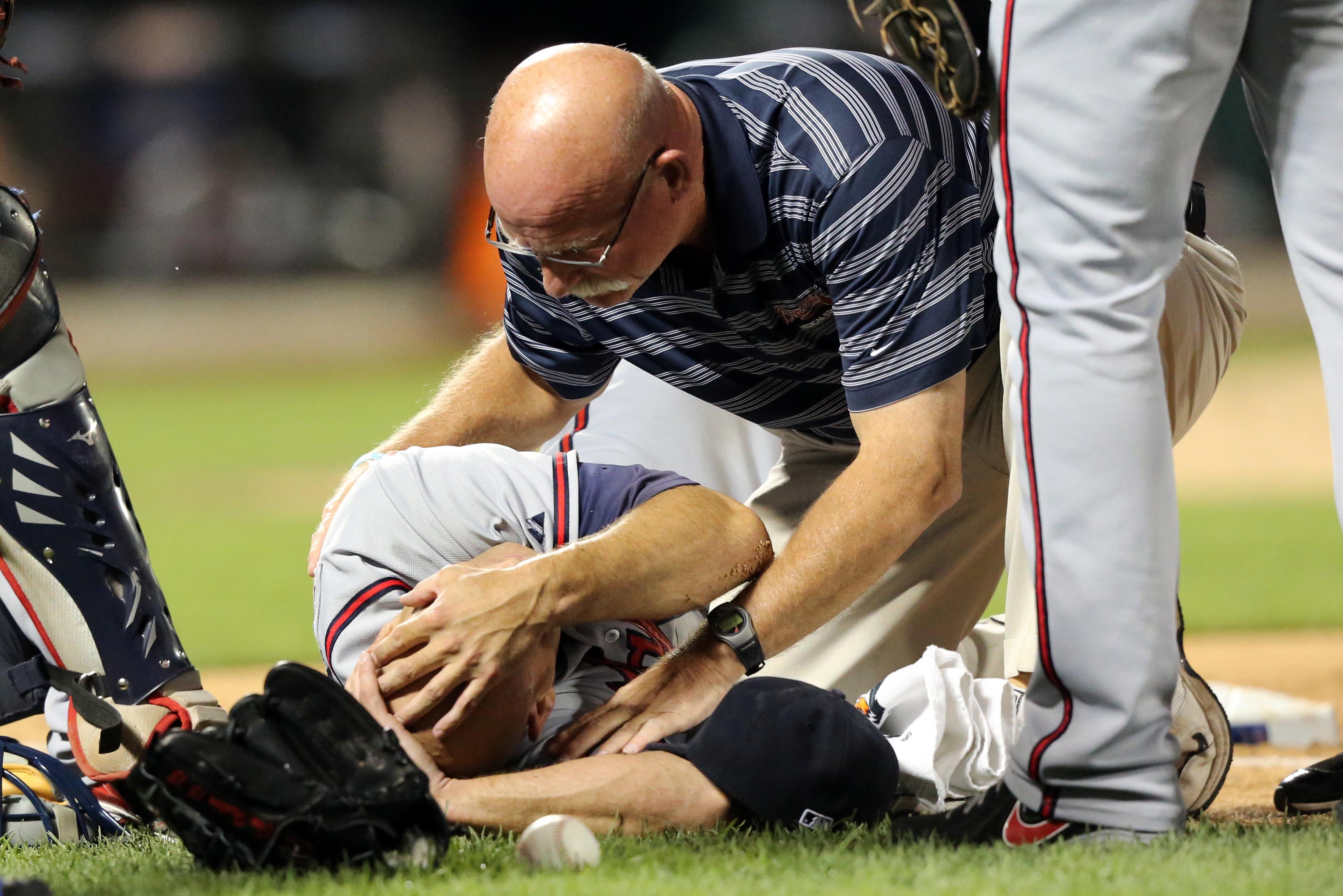 Photos: Atlanta Braves pitcher Tim Hudson ankle injury July 24