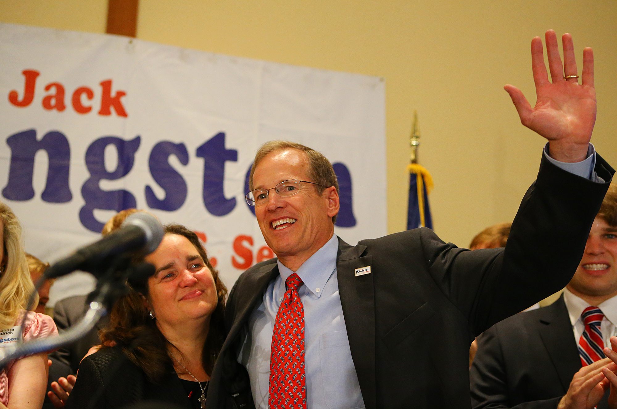 072214 ATLANTA: U.S. Senate candidate Jack Kingston hugs his wife Libby and waves to supporters at the end of his address conceding defeat to David Perdue at his election night party at the Georgia Tech Hotel & Conference Center on Tuesday, July 22, 2014, in Atlanta. CURTIS COMPTON / CCOMPTON@AJC.COM