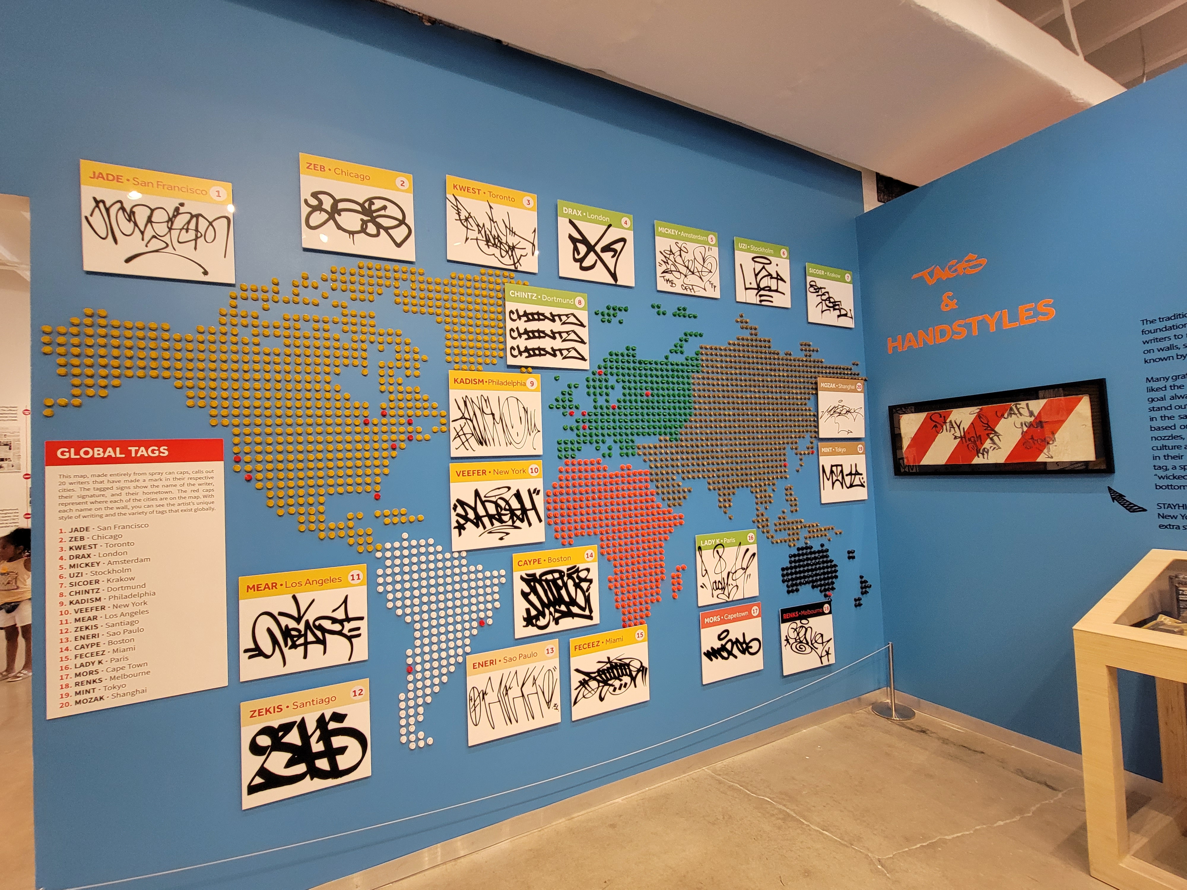 The "Global tags" exhibit at the Museum of Graffiti in Miami, features a map made of spray can caps.  Courtesy of Wesley KH Teo