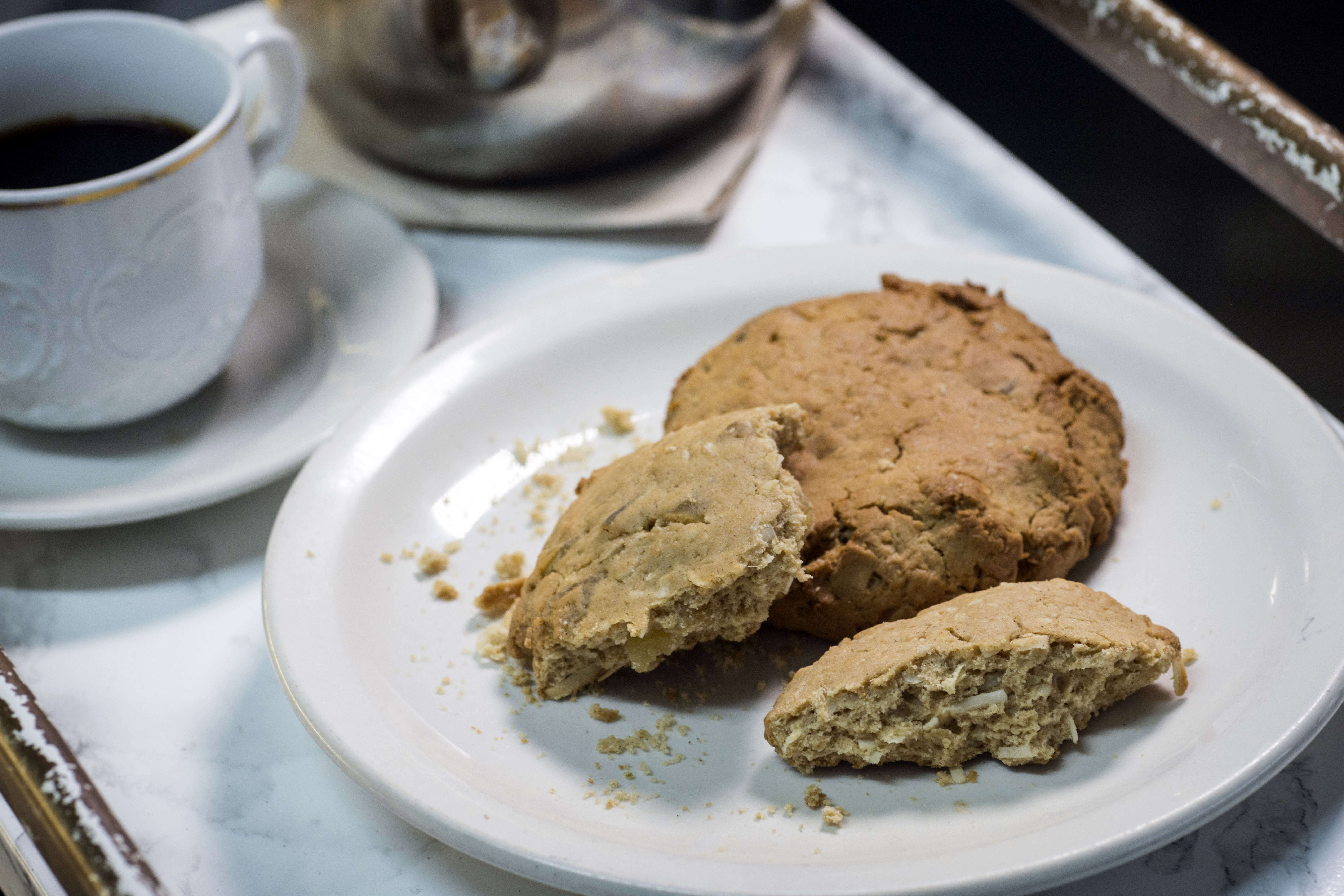 Belinda Baptiste, owner of Unforgettable Bakery and Café, creates items such as Komparét, which features ginger and shredded coconut. (Stephen B. Morton for The Atlanta Journal-Constitution)