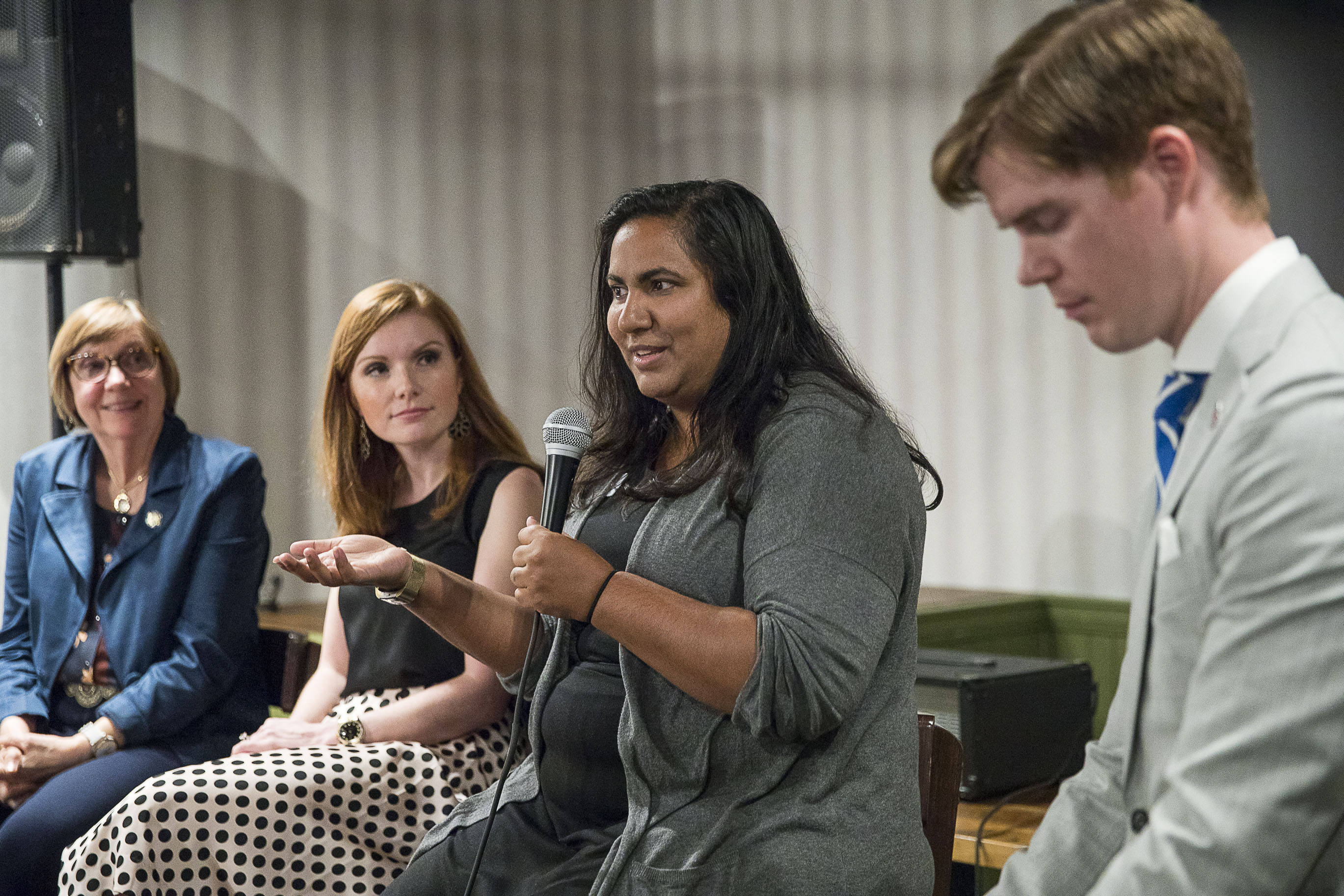 Sunita Theiss (center) speaks on a panel about issues affecting women in Atlanta suburbs during the Atlanta Young Republicans monthly meeting at City Tap in Atlanta, Wednesday, September 25, 2019. (Alyssa Pointer/alyssa.pointer@ajc.com)