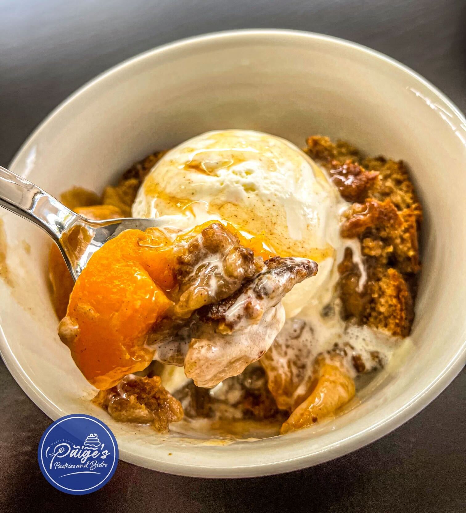 Peach cobbler from the menu of Paige's Bistro.
