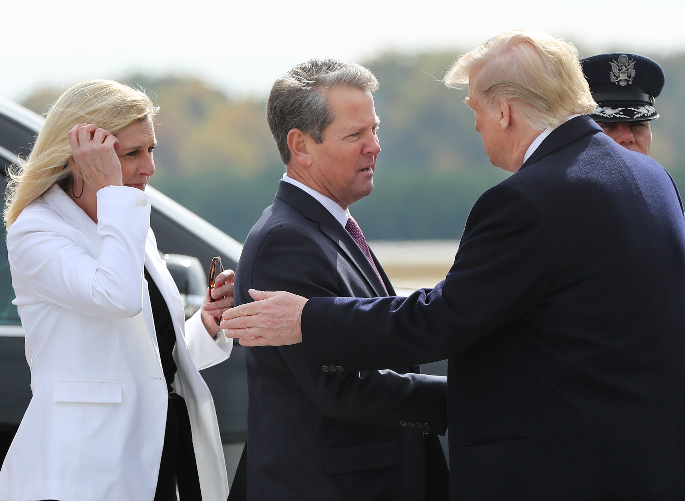 November 8, 2019 Marietta: President Donald Trump is greeted by Georgia Governor Brian Kemp and First Lady Marty Kemp as he arrives at Dobbins AFB on Friday, November 8, 2019, in Marietta. Curtis Compton/ccompton@ajc.com
