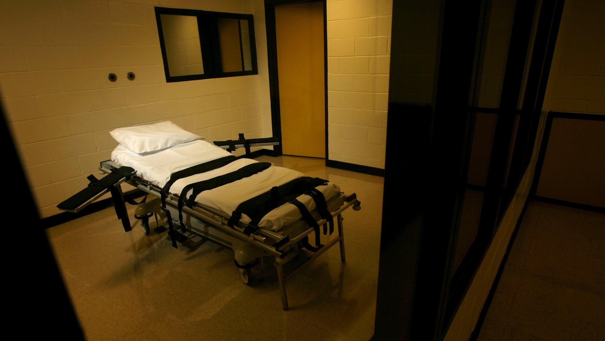 The gurney used for lethal injections sits behind glass windows in a small cinder block building at the Georgia Diagnostic and Classification Prison in Jackson.
