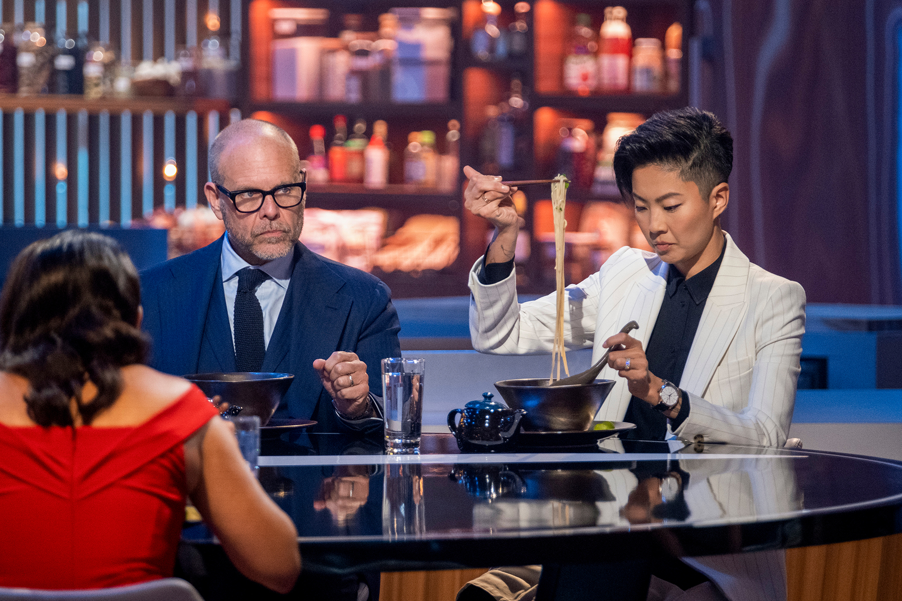 Iron Chef. (L to R) Alton Brown, Kristen Kish in episode 108 of Iron Chef. Cr. Patrick Wymore/Netflix © 2022
