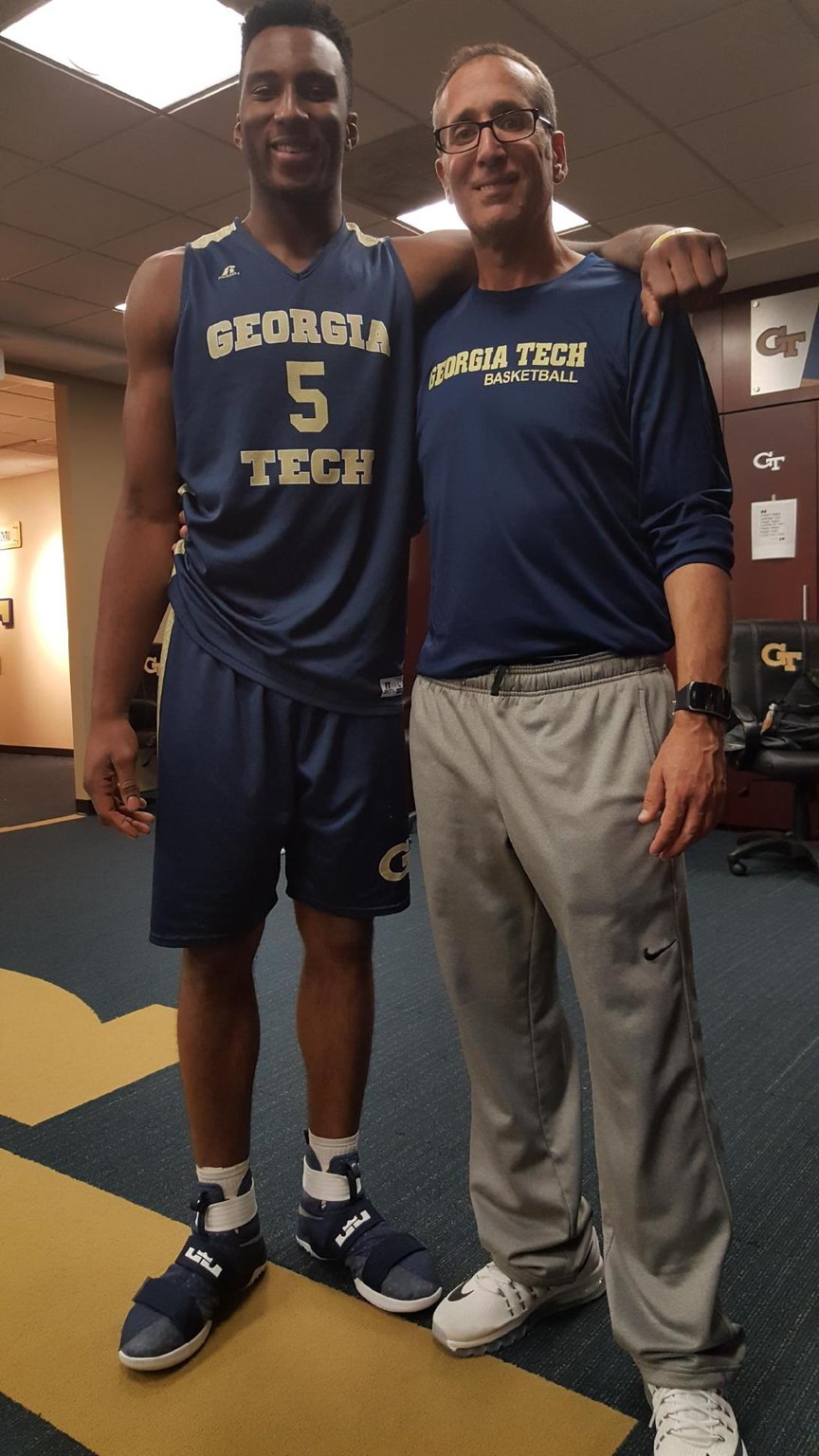 Ron Bell poses with Georgia Tech basketball player Josh Okogie in the team’s locker room in 2017. Among other mischaracterizations to NCAA investigators, Tech coach Ron Pastner said he never allowed Bell, his estranged friend and a former prison inmate, into the locker room.
