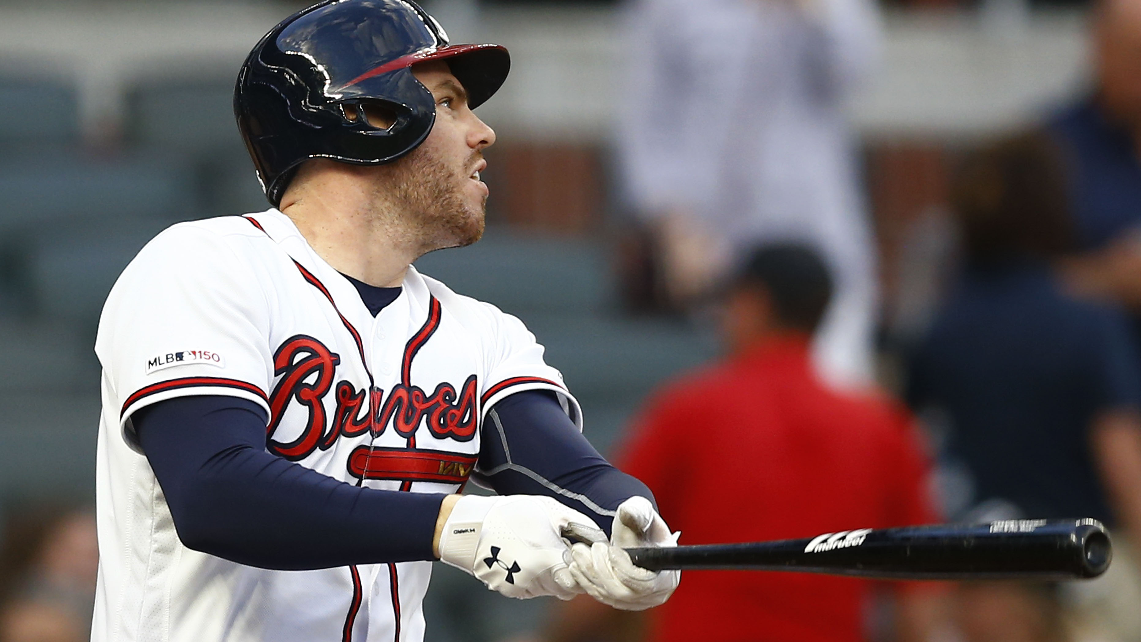 Freddie Freeman hits a double in the first inning against the New York Mets April 11, 2019, at SunTrust Park in Atlanta.