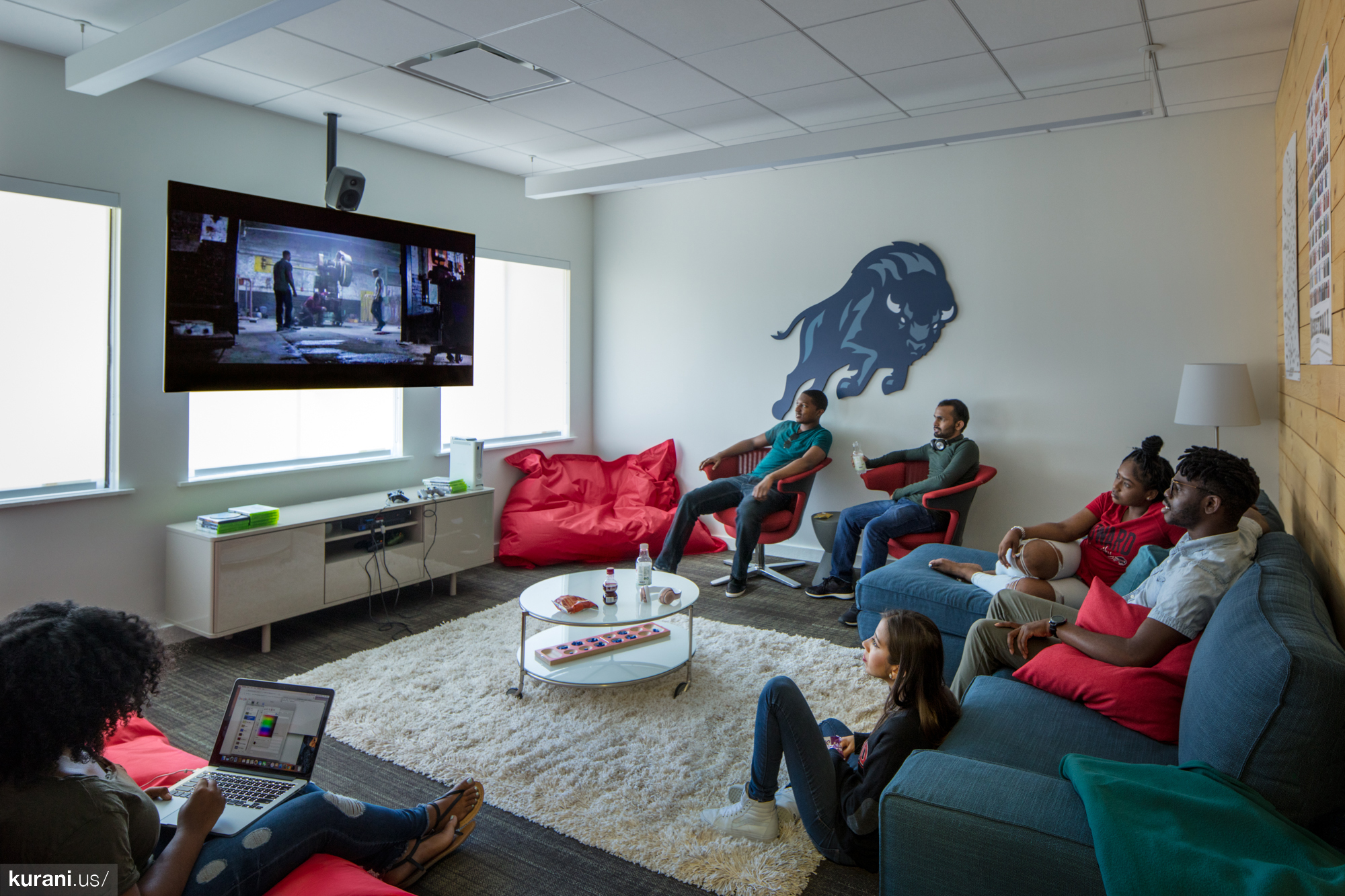 The Howard West Campus media room, designed by Atlanta-based architecture firm, Kurani. at The campus is at Google headquarters in Mountain View, California.