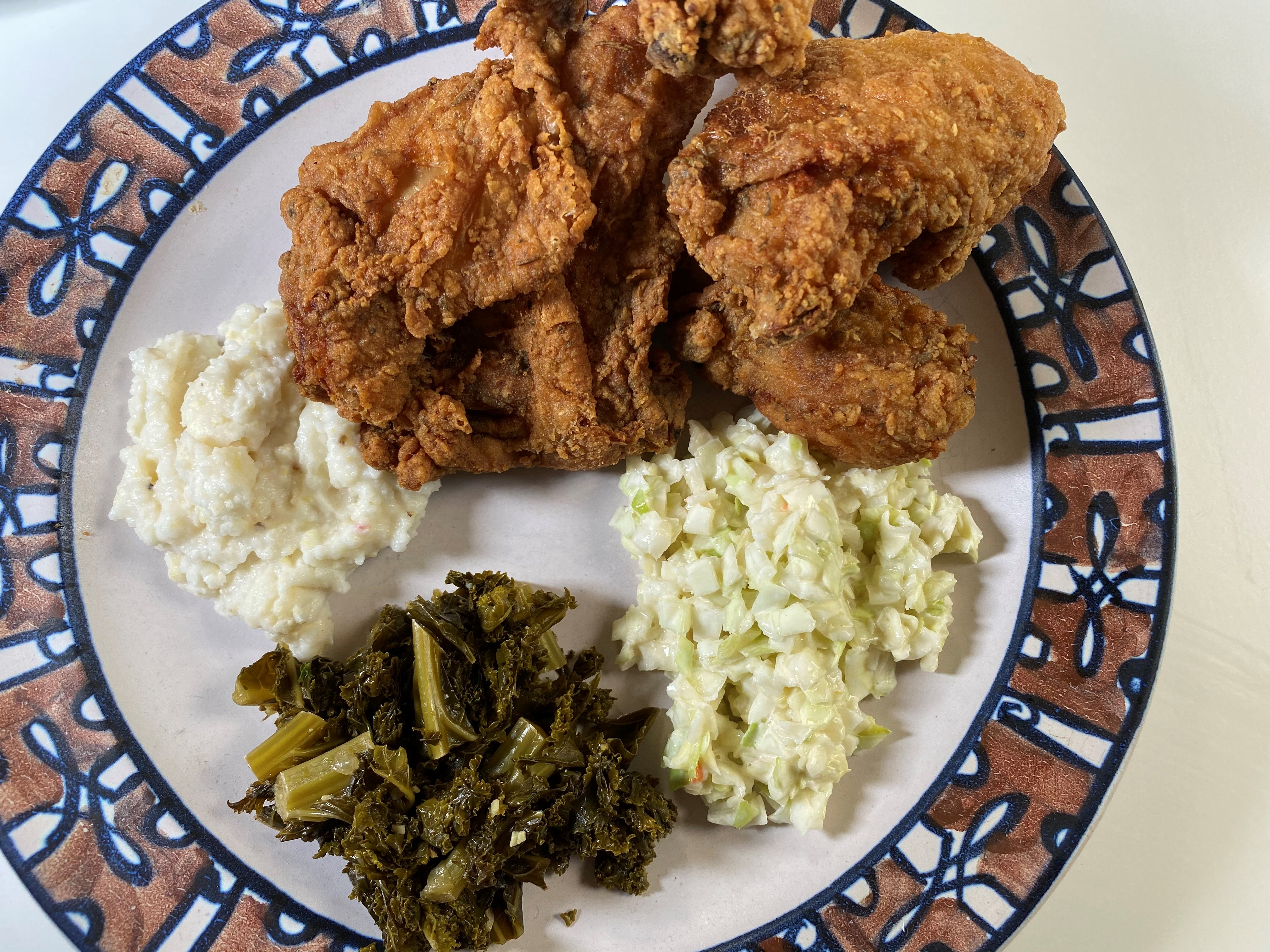Johnny’s four-piece fried chicken combo comes with a breast, wing, leg and thigh, and a choice of sides. Bob Townsend for The Atlanta Journal-Constitution