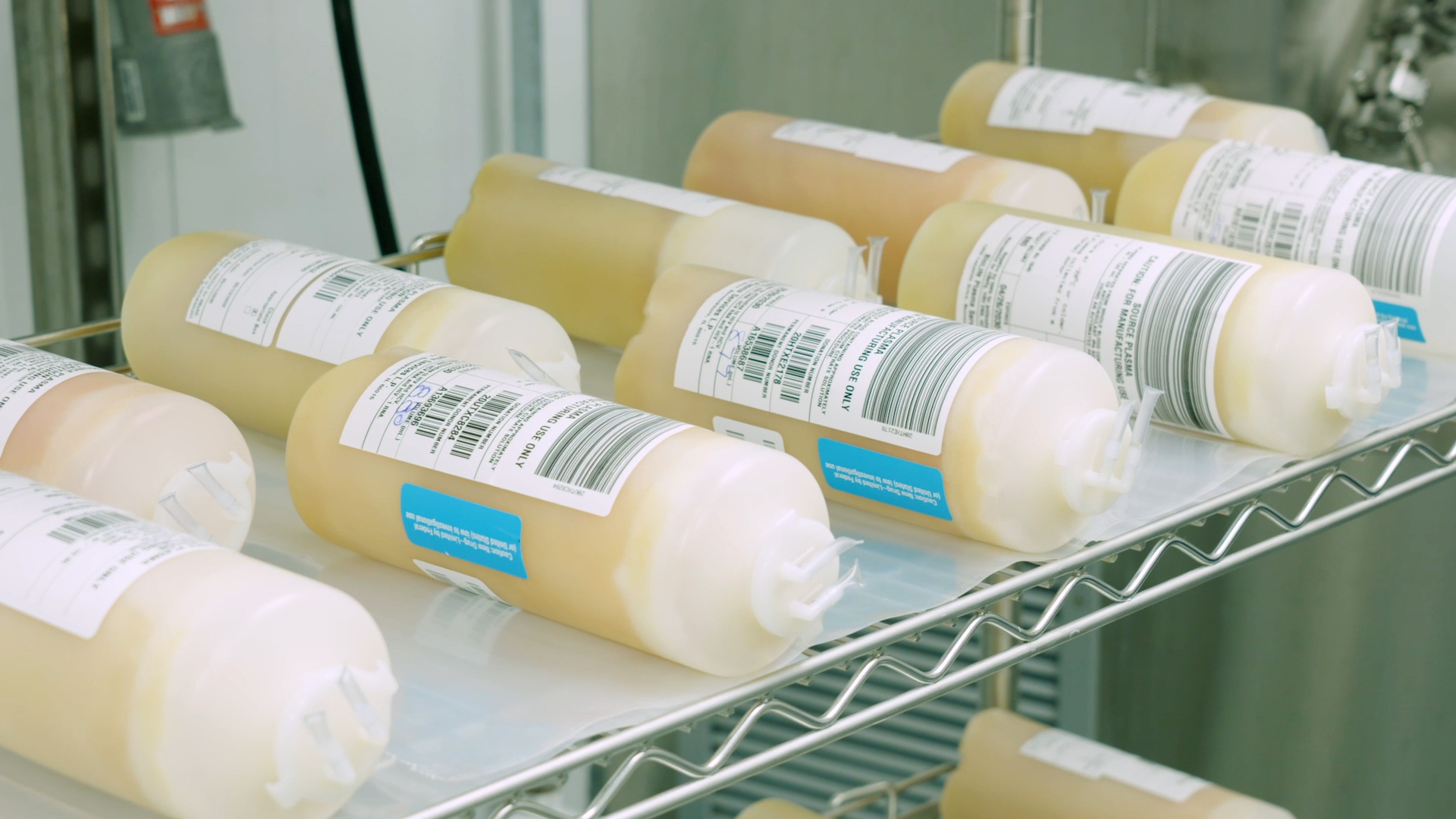 Bottles of frozen convalescent plasma are prepped prior to the start of the fractionation process. Fractionation is the process of extracting proteins, including antibodies, from plasma.
PROVIDED BY TAKEDA