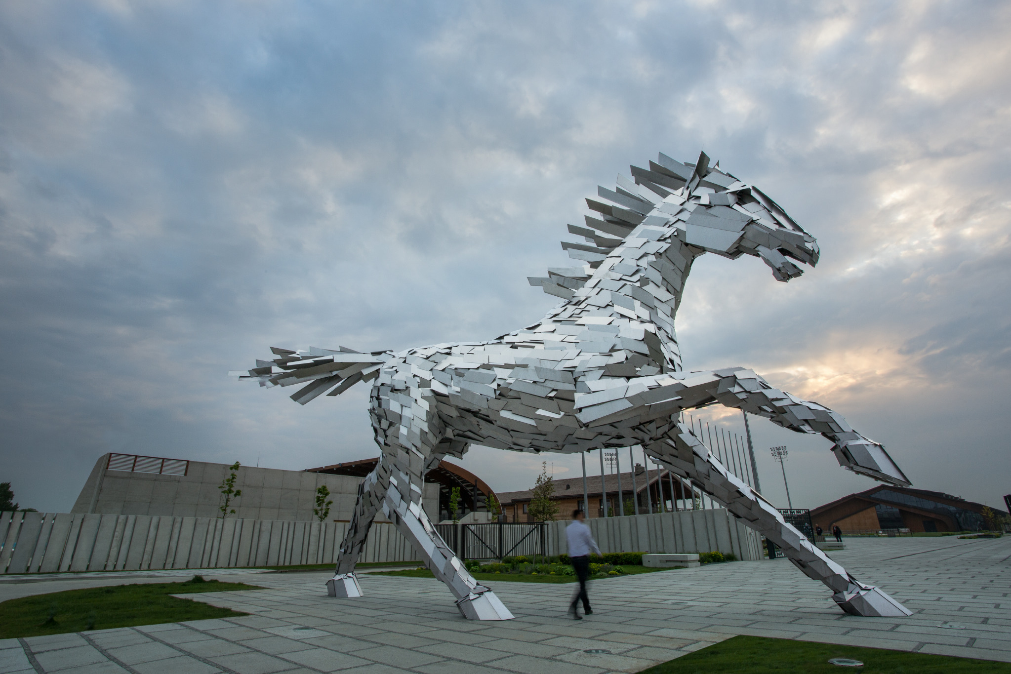 A giant stainless steel falcon is rising up in front of Mercedes-Benz  Stadium - Atlanta Magazine