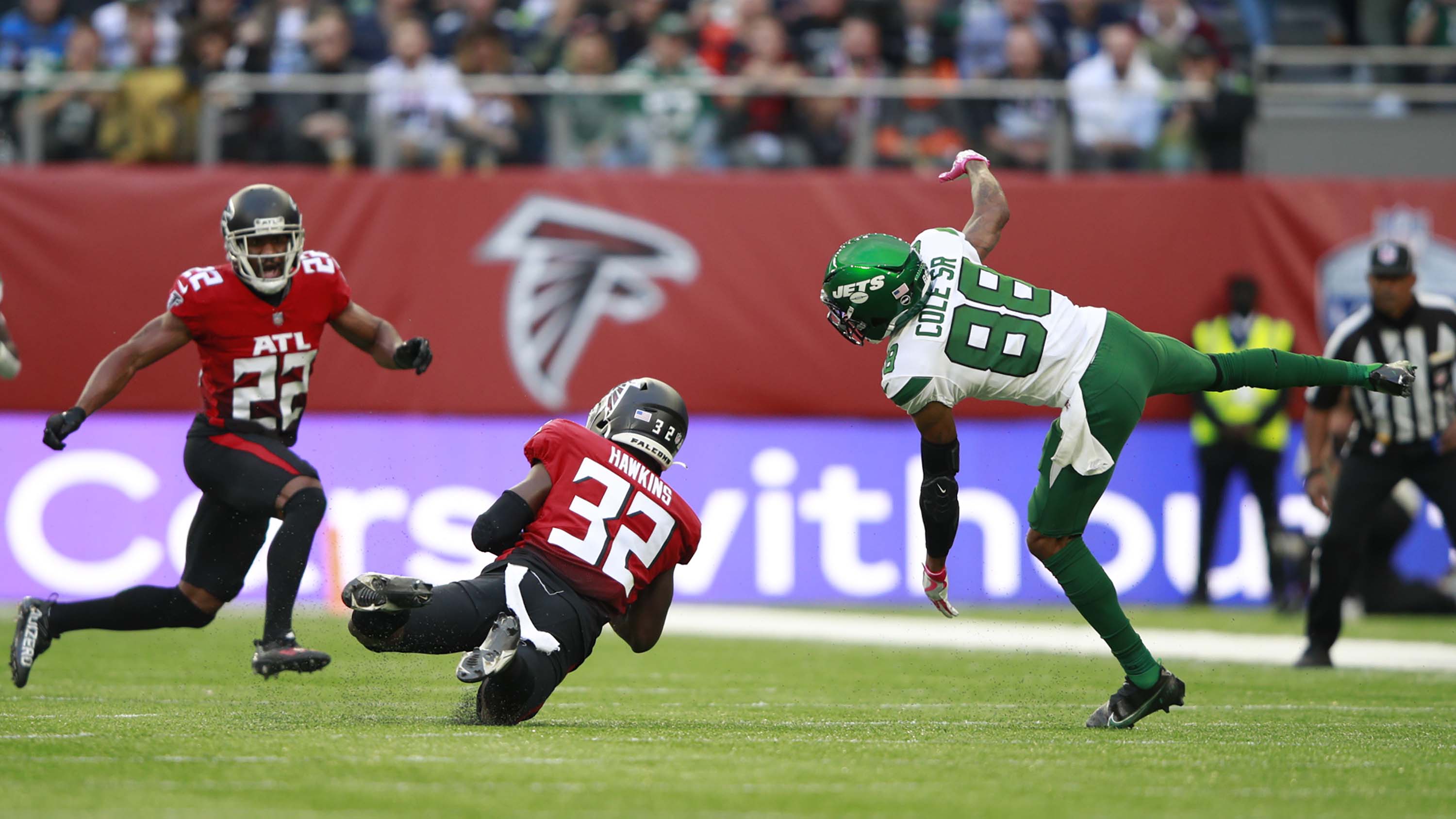 Falcons safety Jaylinn Hawkins (32) makes an interception during the first half against the New York Jets Sunday, Oct. 10, 2021, at Tottenham Hotspur stadium in London, England. (Ian Walton/AP)