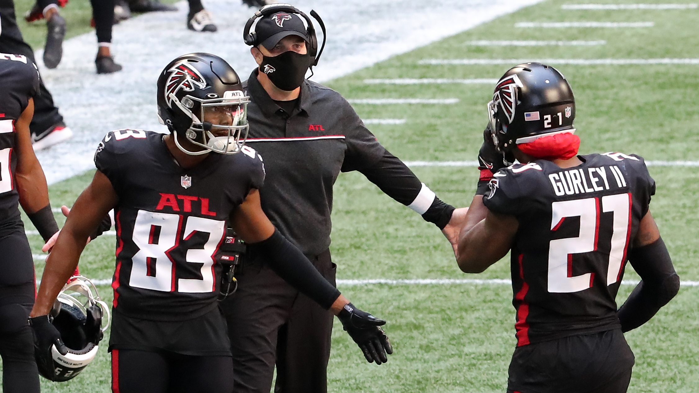 Dante Fowler, Hayden Hurst, Todd Gurley in all-black Falcons jerseys