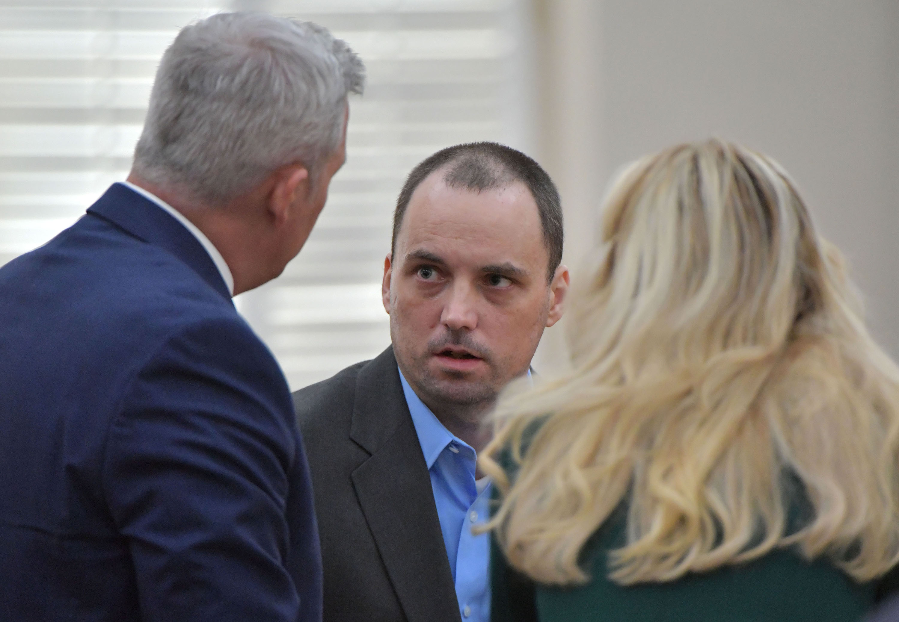 November 26, 2018 Ocilla - Ryan Alexander Duke (center), who charged with murder in the Grinstead case, confer with his attorneys John Merchant (left) and Ashleigh Merchant during motion hearing before Chief Judge of the Tifton Circuit Bill Reinhardt at Irwin County Courthouse in Ocilla on Monday, November 26, 2018. Irwin County prosecutors have agreed to move the murder trial in the Tara Grinstead case. But Judge Bill Reinhardt said he isnât prepared to agree to the venue change yet. Attorneys for both sides want a new location where jurors are less likely to be already prejudiced for one side or the other. Even without the location finalized, a tentative trial date was set for April 1. The former beauty queen and Irwin County teacher was reported missing in 2005, and it remained a cold case until 2017. HYOSUB SHIN / HSHIN@AJC.COM
