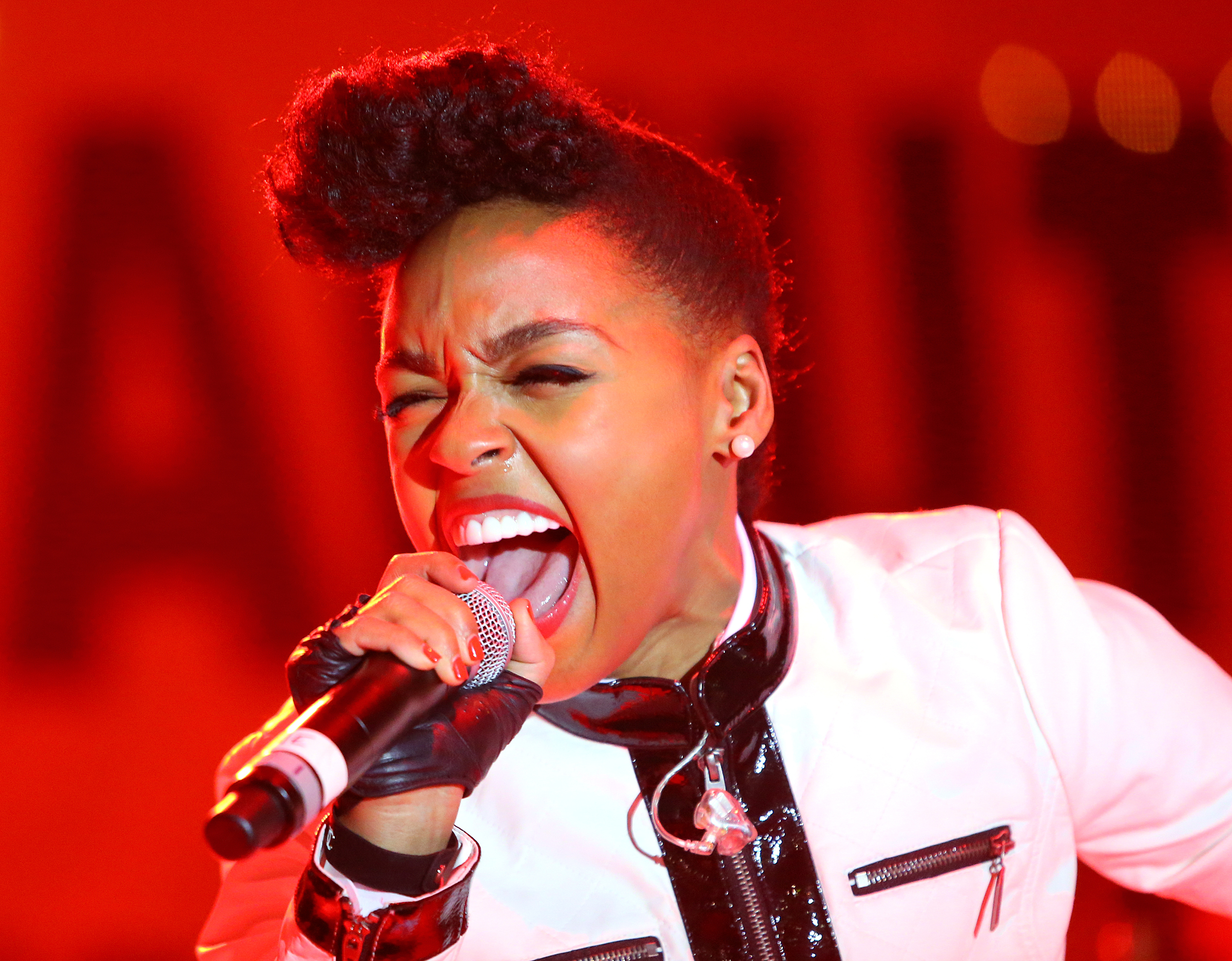 123113 ATLANTA: Headliner Janelle Monae performs on the main stage just before the Peach Drop at Underground Atlanta on Tuesday, Dec. 31, 2013, in Atlanta. CURTIS COMPTON / CCOMPTON@AJC.COM