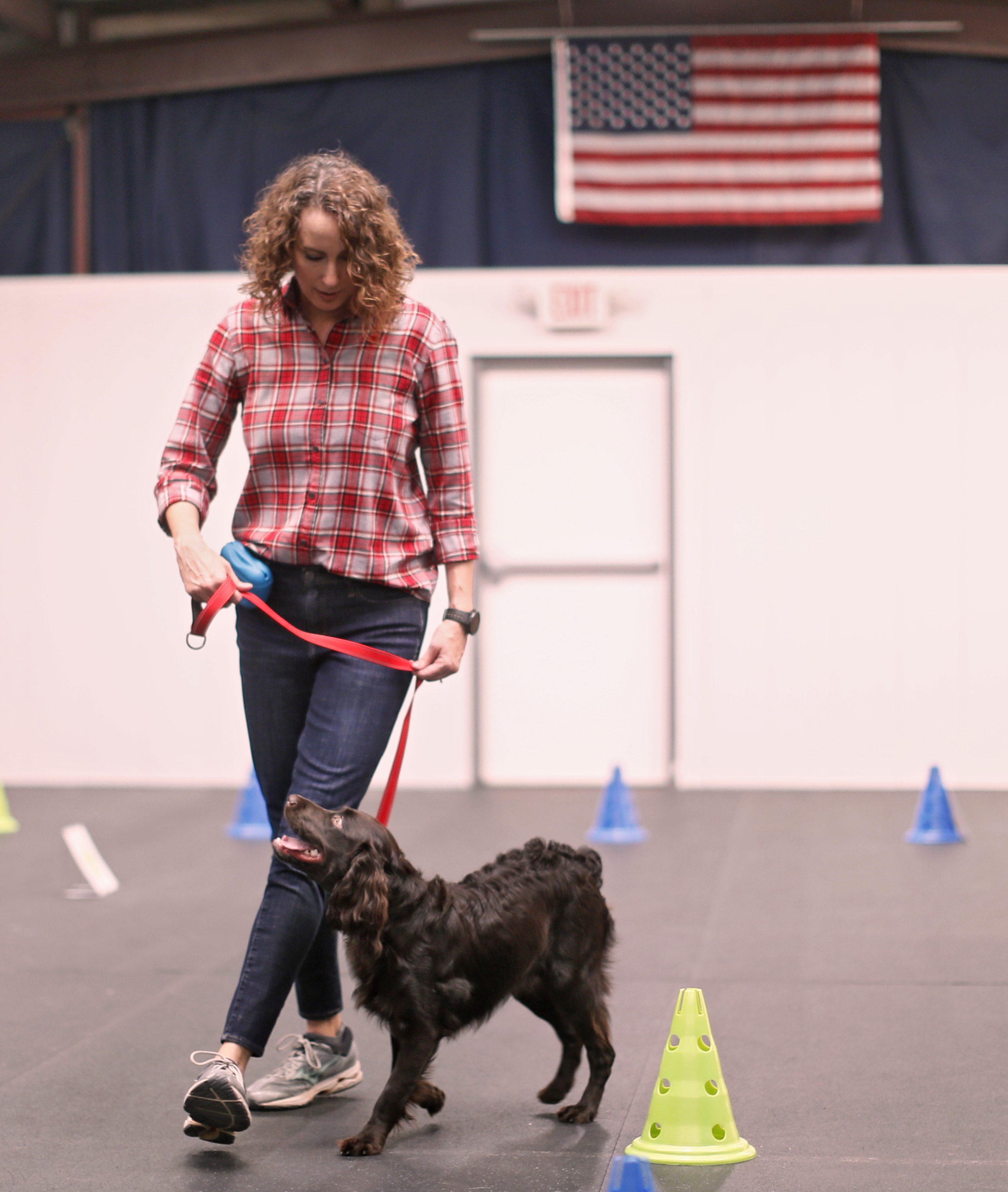 Karla Jacobs works with the family dog, Jackson (named for Jackson, WY) at an obedience training class in Marietta. Bob Andres / robert.andres@ajc.com