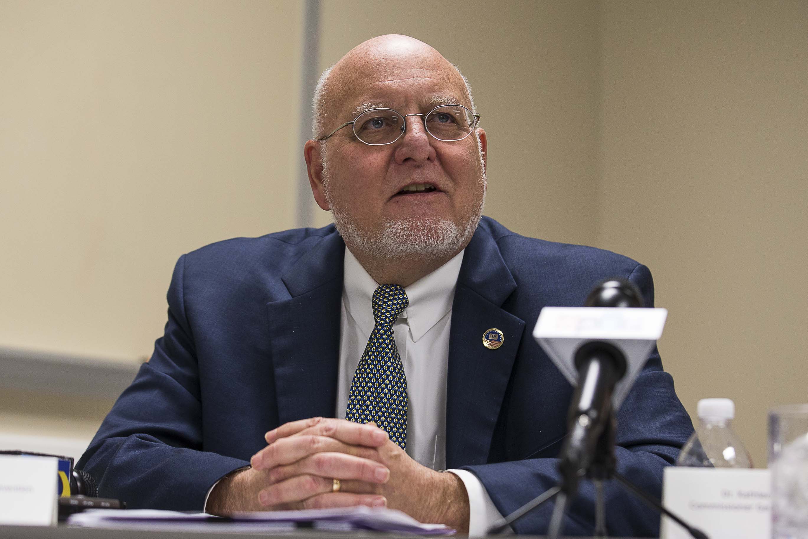 CDC Director Robert Redfield began his career at Walter Reed Army Medical Center and became well known for studying the spread of HIV. He promoted placing infected soldiers in quarantine and aligned himself with an evangelical Christian group that pushed for abstinence-only programs. But he has since tempered his views. Redfield is seen here in December speaking during a panel discussion on stopping the spread of HIV. ALYSSA POINTER / ALYSSA.POINTER@AJC.COM