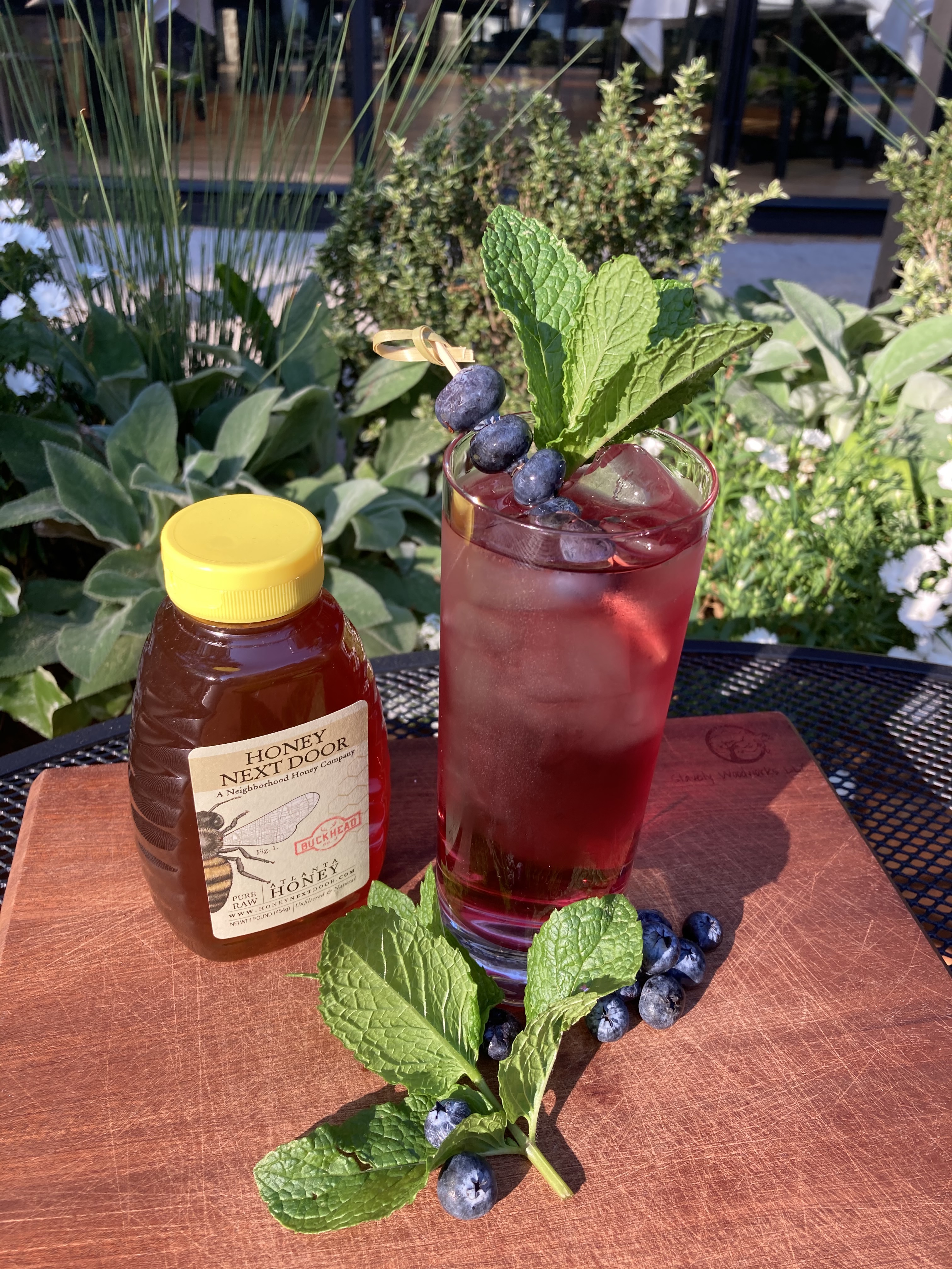 This muddled blueberry rum cocktail is garnished with mint from the Chastain's own garden. Courtesy of the Chastain