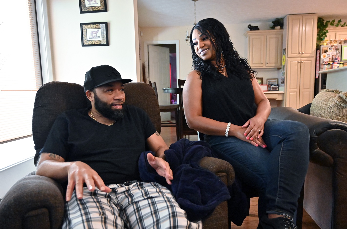 COVID-19 survivor David Simpson with his wife Veronica at their home in West Point. “I was so scared that he was going to die,” said Veronica Simpson, who had just celebrated their 25th wedding anniversary with him before he became ill. “I was praying and asking God to keep him here.”