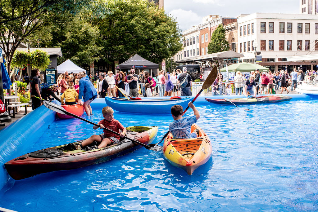 Try paddle sports in a makeshift pool on the streets of downtown Roanoke, Virginia at GO Fest, along with many other outdoor activities.  (Courtesy of the Roanoke Outside Foundation)