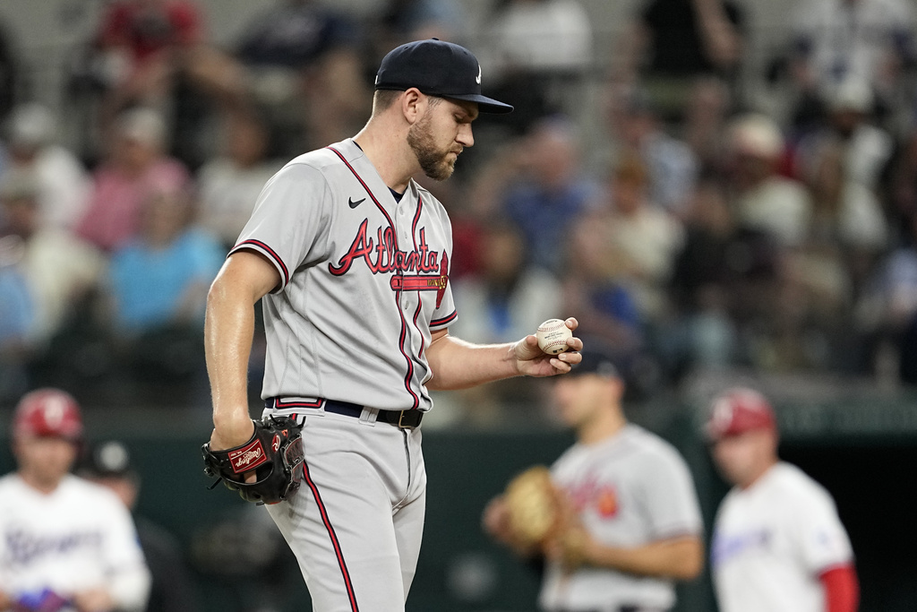 Atlanta Braves' Dylan Lee pitches during the seventh inning of a