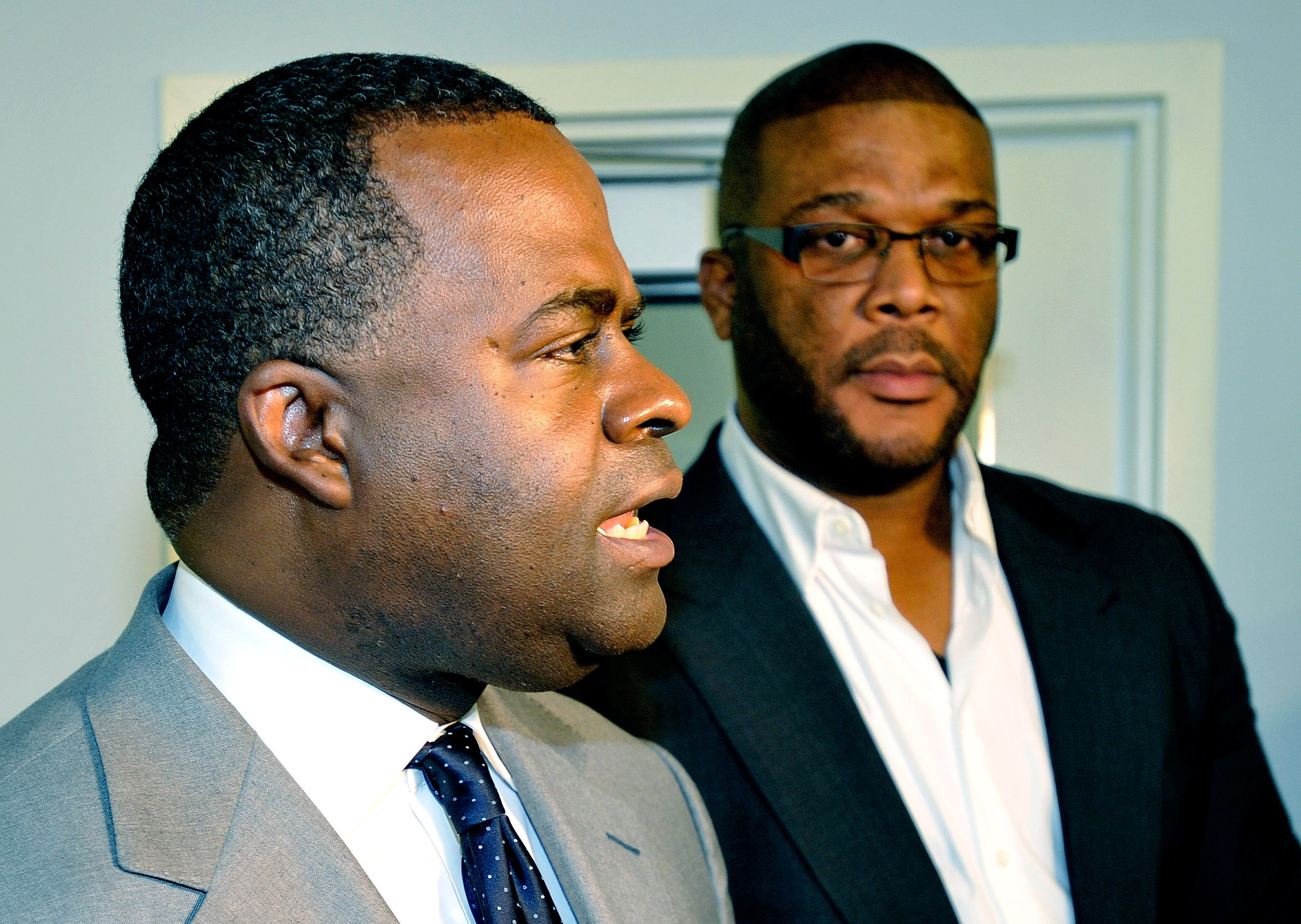 Atlanta Mayor Kasim Reed and filmmaker Tyler Perry during a meeting of the McPherson Implementing Local Redevelopment Authority.