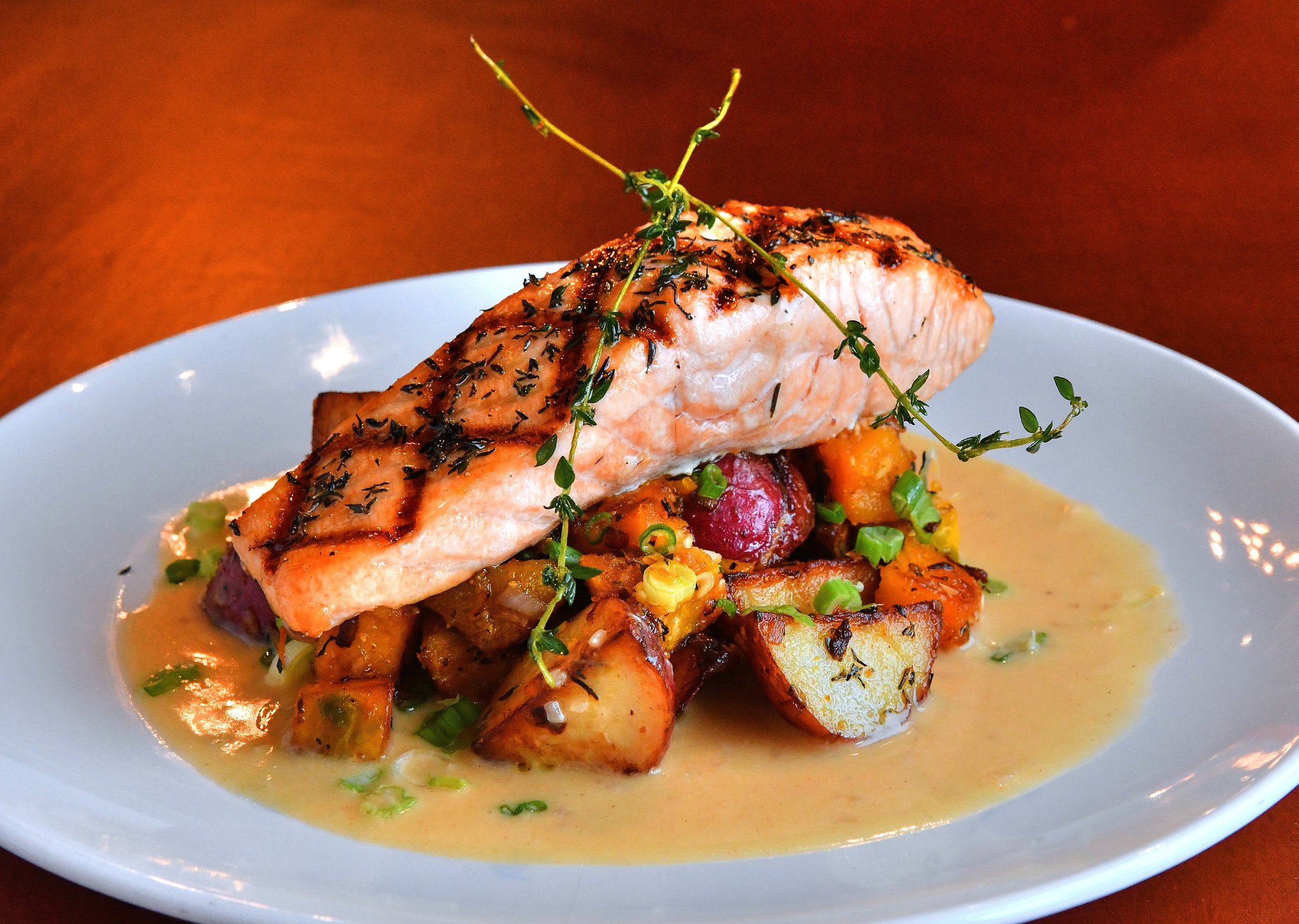 Bay of Fundy Grilled Salmon, Calabaza hash, lemon beurre blanc. (Contributed by Chris Hunt Photography)