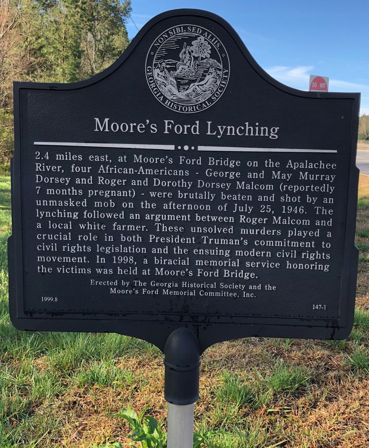 This historic marker at Highway 79 and Locklin Road commemorates the lynching of George and Mae Dorsey and Roger and Dorothy Malcom in 1946. It was erected by the Georgia Historical Society and the Moore’s Ford Memorial Committee. GRACIE BONDS STAPLES / GSTAPLES@AJC.COM