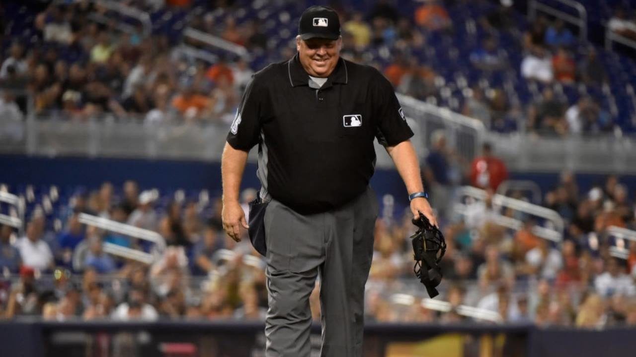 Major League Baseball umpire Rob Drake looks on from the field during  News Photo - Getty Images