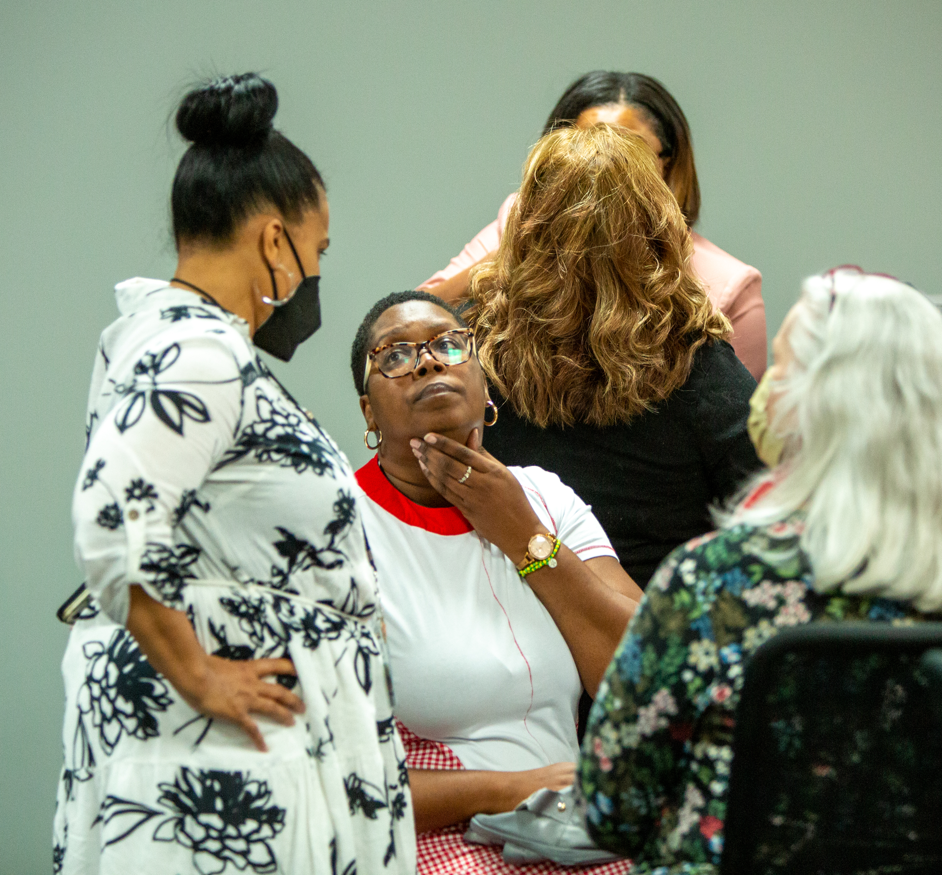 DeKalb County Elections Executive Director Keisha Smith (left) and Dele Lowman Smith (seated), chairwoman of the DeKalb County elections board, talk after hours of testing machines for a recount Saturday, May 28, 2022. (Photo: Jenni Girtman for The Atlanta Journal-Constitution)