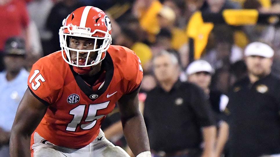 Former UGA linebacker D'Andre Walker practices in front of NFL scouts