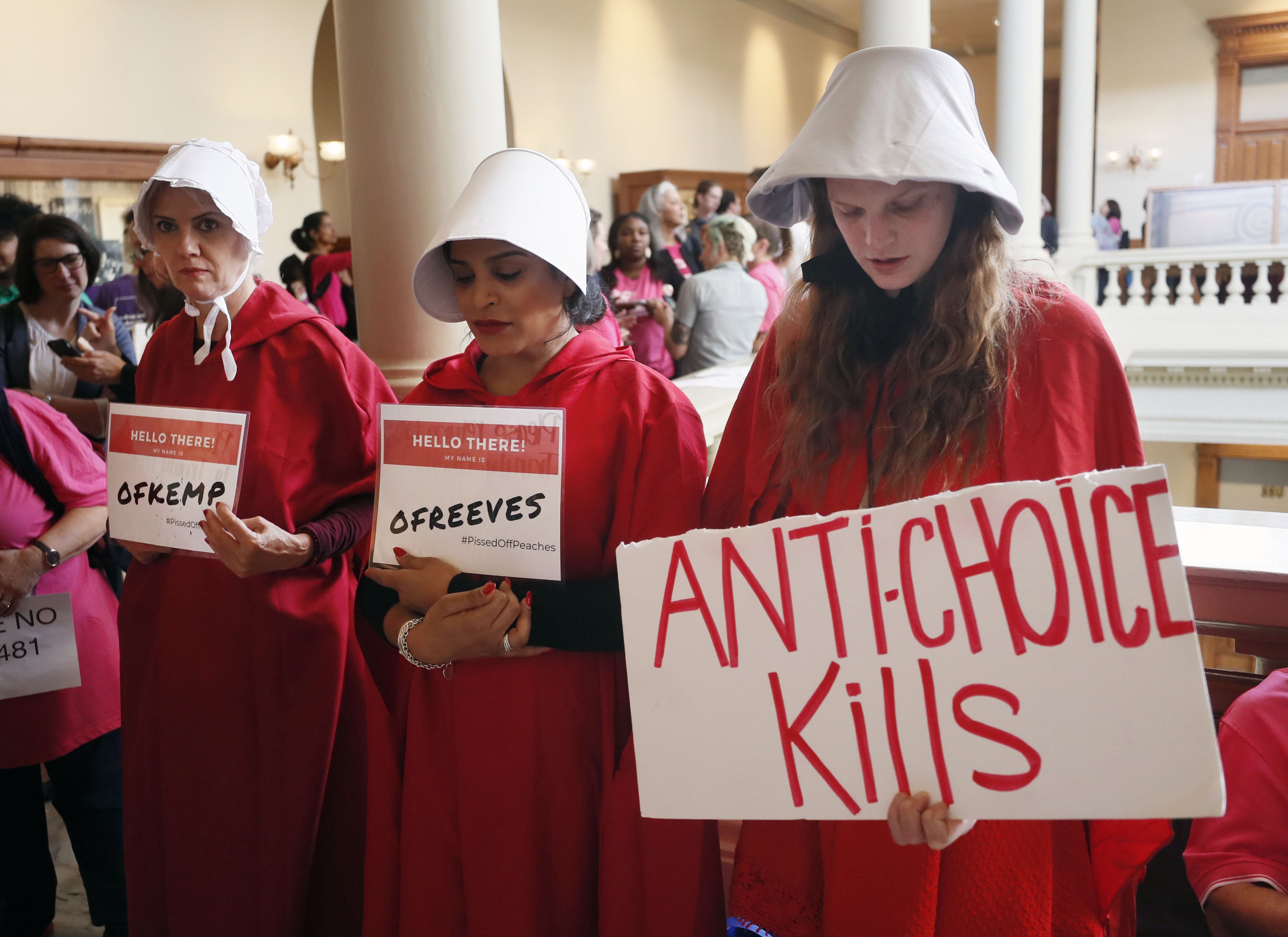 March 14, 2019 - Atlanta - Georgia members of the Handmaid Coalition were protesting HB 481 outside the Capitol today. A Senate hearing was held Thursday for the "fetal heartbeat bill." Advocates on both sides are expected to fill the Capitol as the committee debates the bill that would outlaw most abortions after six weeks. Bob Andres / bandres@ajc.com