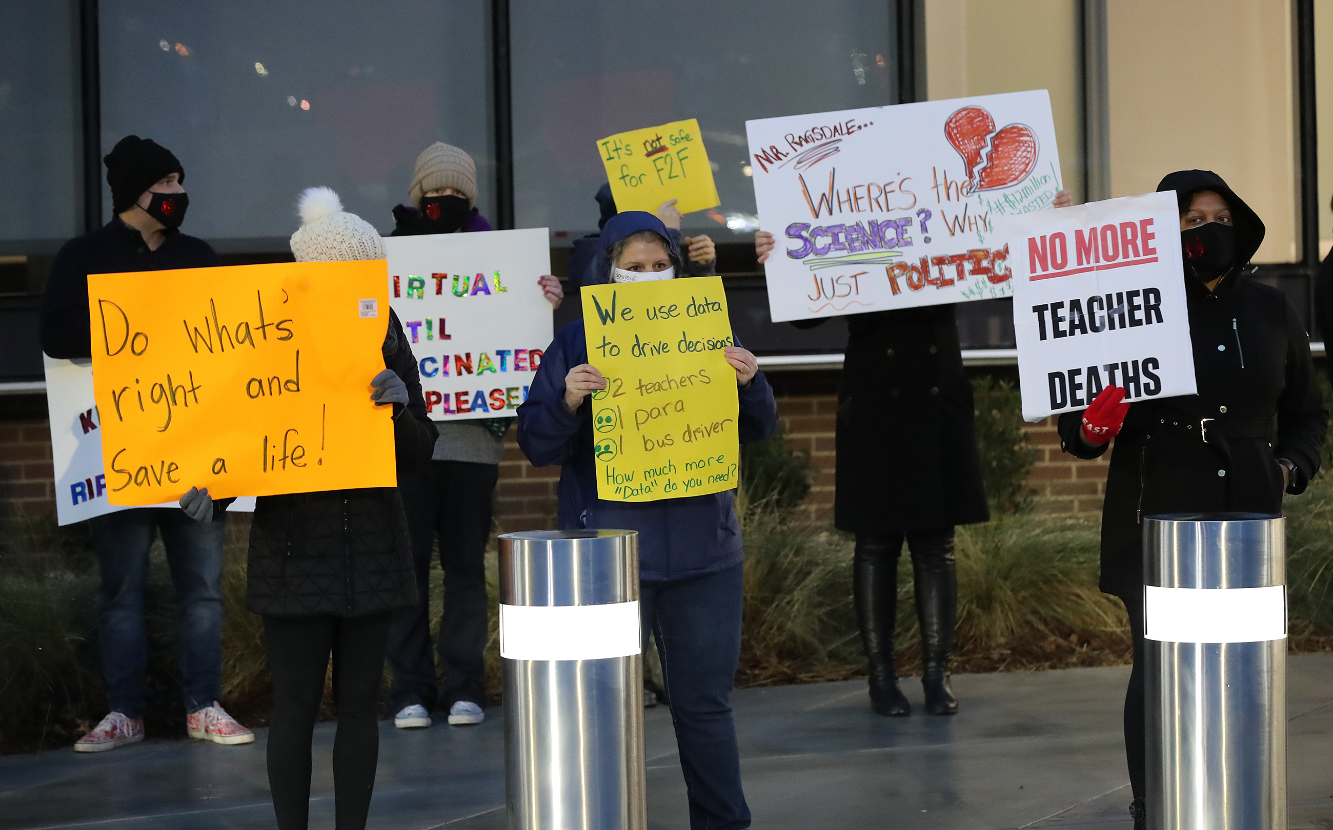 012121 Marietta: Hundreds of Cobb County teachers and staff hold a protest in the parking lot during the school board meeting at the Cobb County School District's Offices on Thursday, Jan. 21, 2021, in Marietta. Cobb teachers are pressing the district for improved COVID-19 response. Curtis Compton / Curtis.Compton@ajc.com”