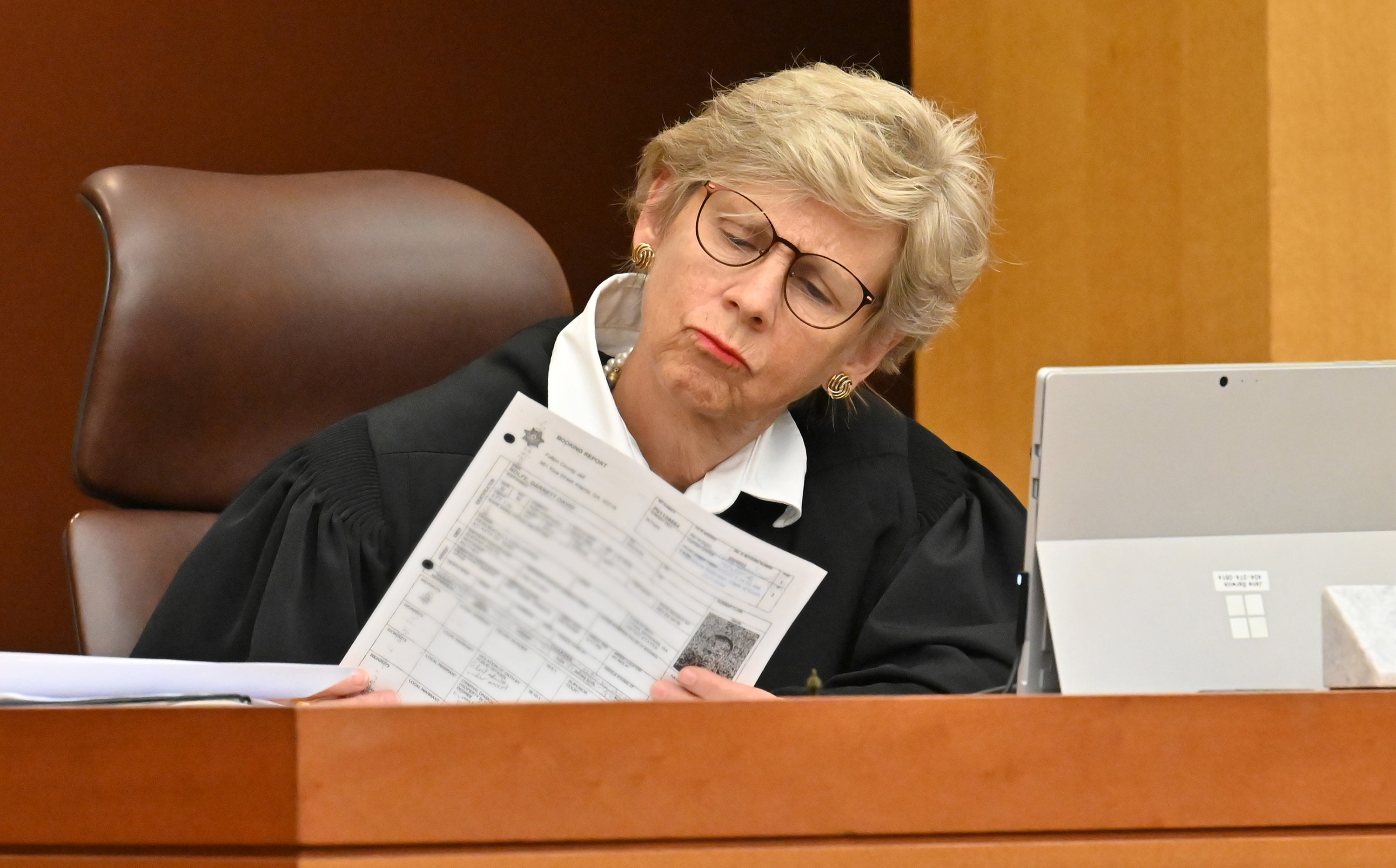 Fulton Superior Court Judge Jane Barwick goes over the booking report of former Atlanta police officer Garrett Rolfe during a bond hearing for Rolfe via Zoom on Tuesday, June 30, 2020. (Hyosub Shin / Hyosub.Shin@ajc.com)