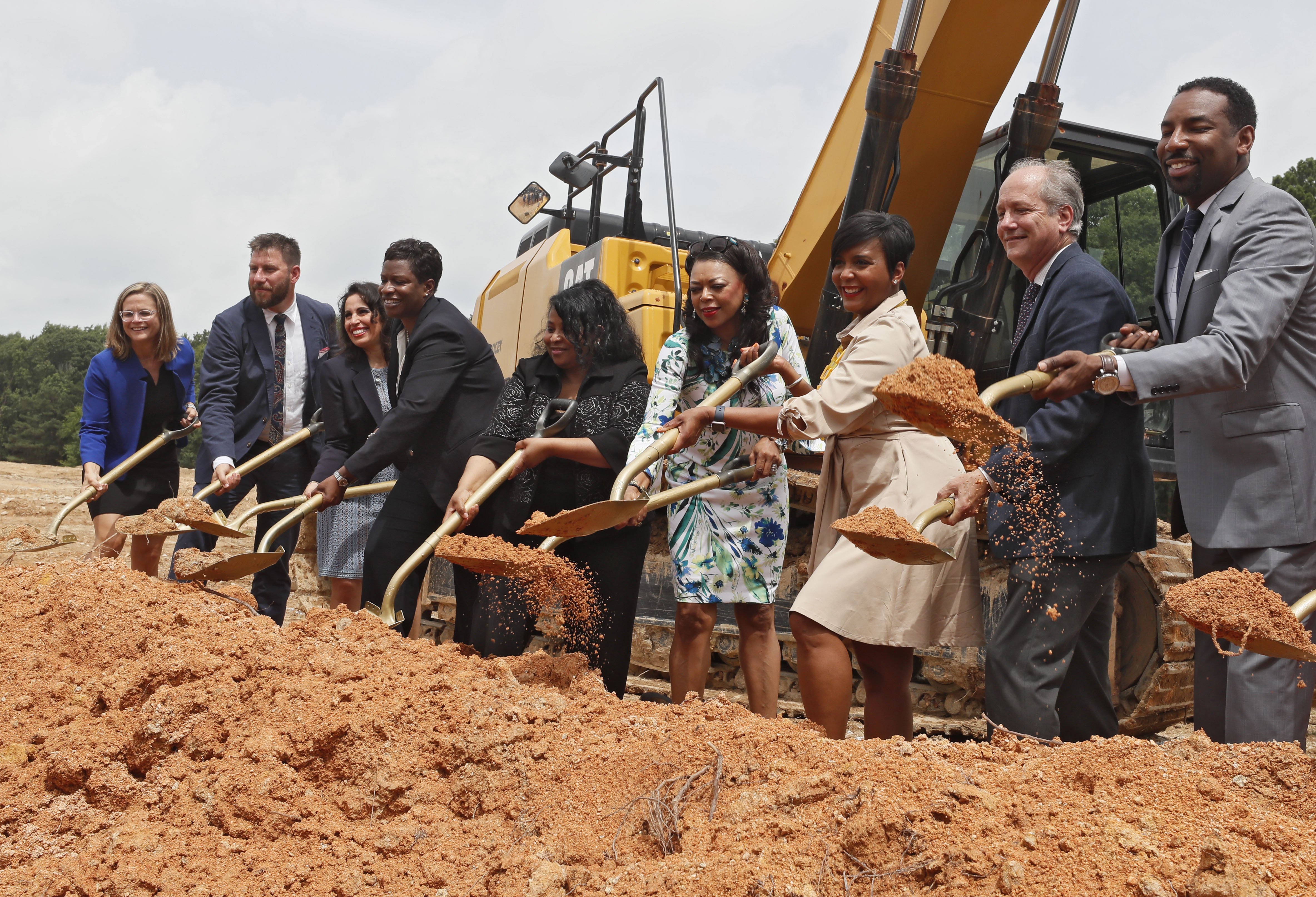 June 24, 2019 - Atlanta - Atlanta Mayor Keisha Lance Bottoms (third from right) participates in a ground breaking as she unveiled a new affordable housing plan at a press conference on Monday. Her One Atlanta: Housing Affordability Action Plan is intended to serve as a roadmap to increase the supply of housing in the City of Atlanta for a full spectrum of residents. Speakers included Bottoms, Jon Keen, Atlanta Deputy COO, Terri Lee, Atlanta Chief Housing Officer, Denise Cleveland-Leggett, HUD Regional Director, John O'Callaghan, President and CEO, ANDP and Sarah Kirsch, Executive Director, Urban Land Institute. Bob Andres / bandres@ajc.com