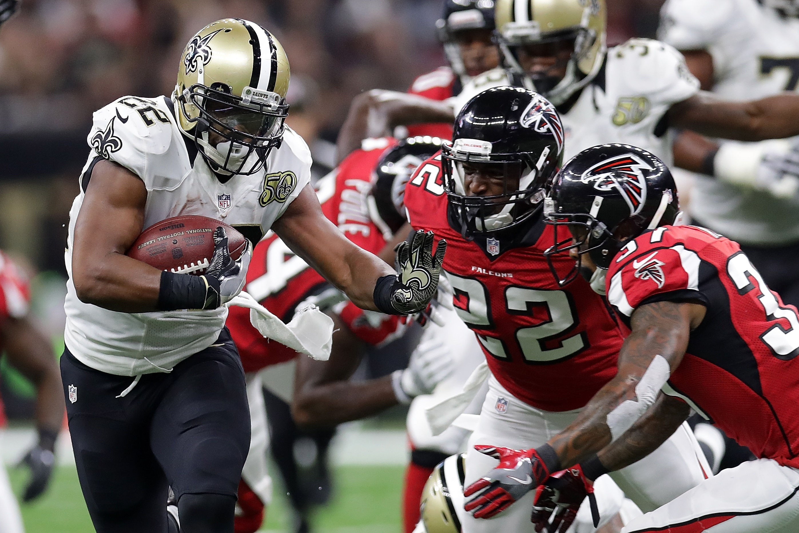 New Orleans Saints running back Mark Ingram (22) is tackled by