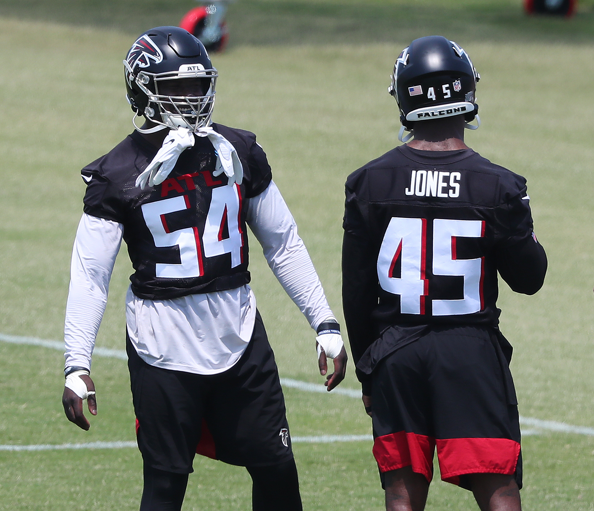 Atlanta Falcons outside linebacker Adetokunbo Ogundeji (92) works