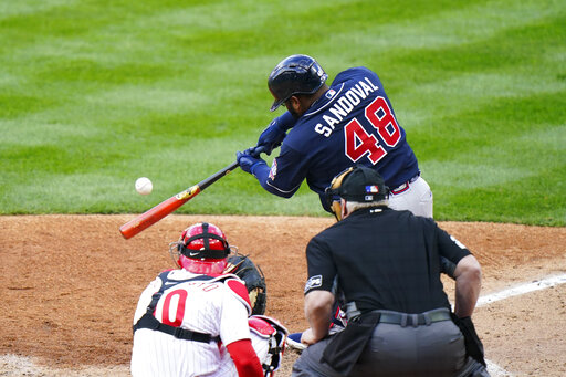 Atlanta Braves' Pablo Sandoval (48) runs after hitting a home run